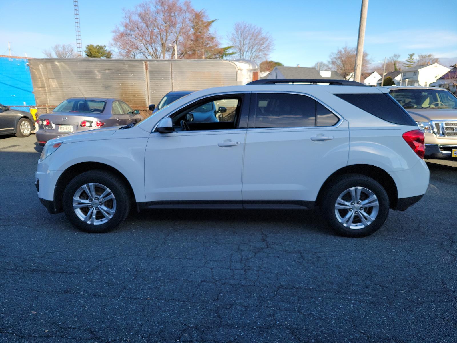 2011 Summit White - GAZ /Jet Black - AFJ Chevrolet Equinox LT w/1LT (2CNFLEEC3B6) with an ENGINE, 2.4L DOHC, 4-CYLINDER SIDI (SPARK IGNITION DIRECT INJECTION) engine, located at 50 Eastern Blvd., Essex, MD, 21221, (410) 686-3444, 39.304367, -76.484947 - <p>A practically perfect blend of utility, efficiency, and space, our 2011 Chevrolet Equinox 1LT AWD in Summit White takes you down the road with style and finesse! Powered by a 2.4 Liter 4 Cylinder that offers 182hp while paired with a smooth-shifting 6 Speed Automatic transmission. With this All W - Photo #6