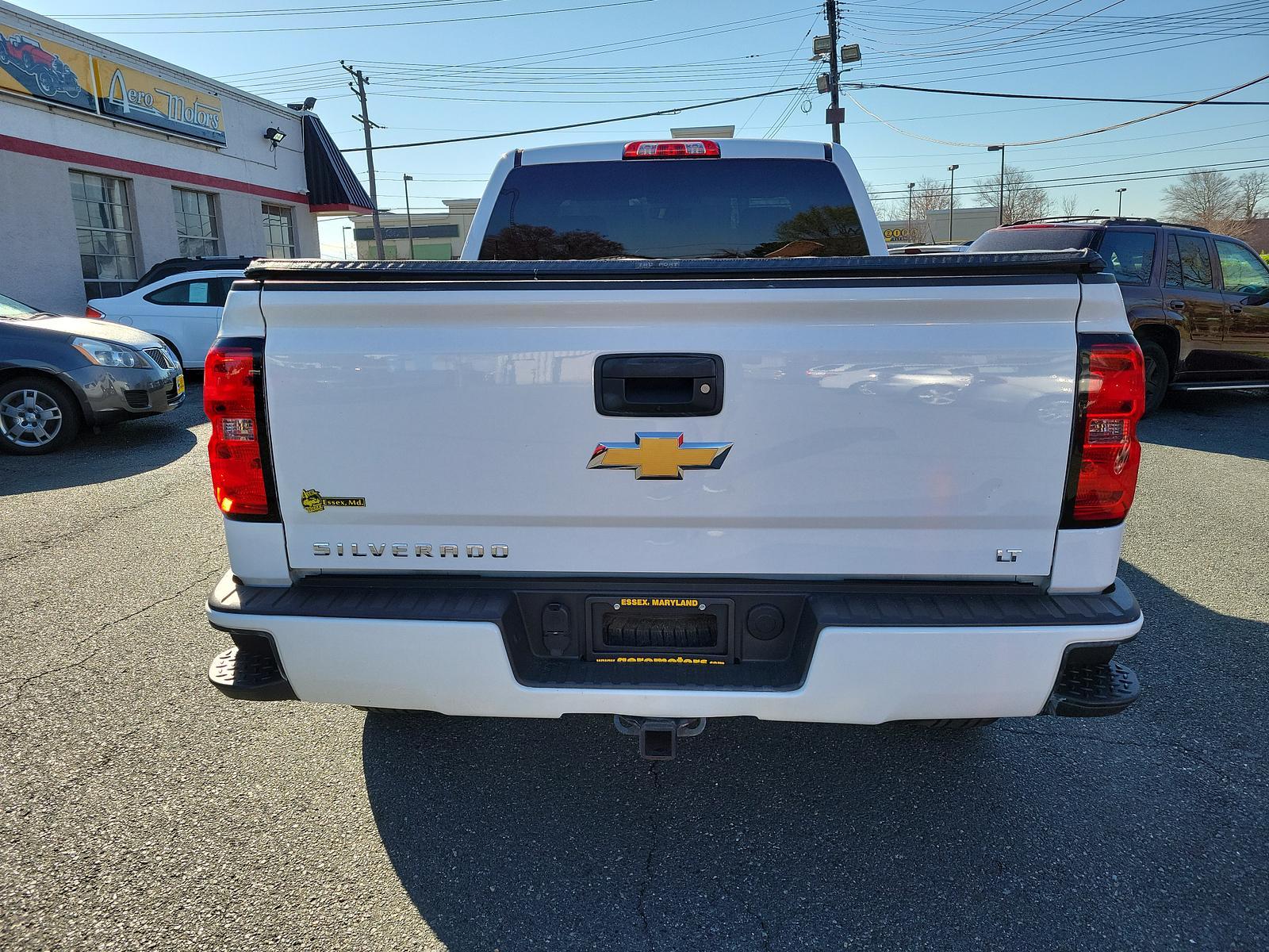 2016 Summit White - GAZ /Jet Black - H0U Chevrolet Silverado 1500 LT (1GCVKREC1GZ) with an ENGINE, 5.3L ECOTEC3 V8 WITH ACTIVE FUEL MANAGEMENT, DIRECT INJECTION AND VARIABLE VALVE TIMING engine, located at 50 Eastern Blvd., Essex, MD, 21221, (410) 686-3444, 39.304367, -76.484947 - <p>Capable for play, plenty strong for work, and tough enough for your family, our 2016 Chevrolet Silverado 1500 LT Double Cab 4X4 is ready to serve you in Summit White! Powered by a 5.3 Liter EcoTec3 V8 that offers 355hp paired with a 6 Speed Automatic transmission with tow/haul mode. This Four Whe - Photo #4