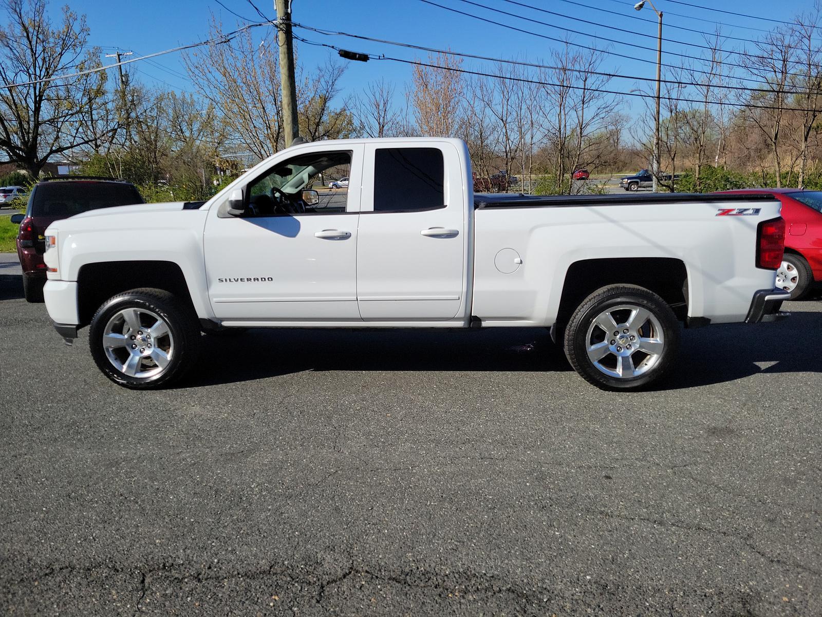2016 Summit White - GAZ /Jet Black - H0U Chevrolet Silverado 1500 LT (1GCVKREC1GZ) with an ENGINE, 5.3L ECOTEC3 V8 WITH ACTIVE FUEL MANAGEMENT, DIRECT INJECTION AND VARIABLE VALVE TIMING engine, located at 50 Eastern Blvd., Essex, MD, 21221, (410) 686-3444, 39.304367, -76.484947 - <p>Capable for play, plenty strong for work, and tough enough for your family, our 2016 Chevrolet Silverado 1500 LT Double Cab 4X4 is ready to serve you in Summit White! Powered by a 5.3 Liter EcoTec3 V8 that offers 355hp paired with a 6 Speed Automatic transmission with tow/haul mode. This Four Whe - Photo #6