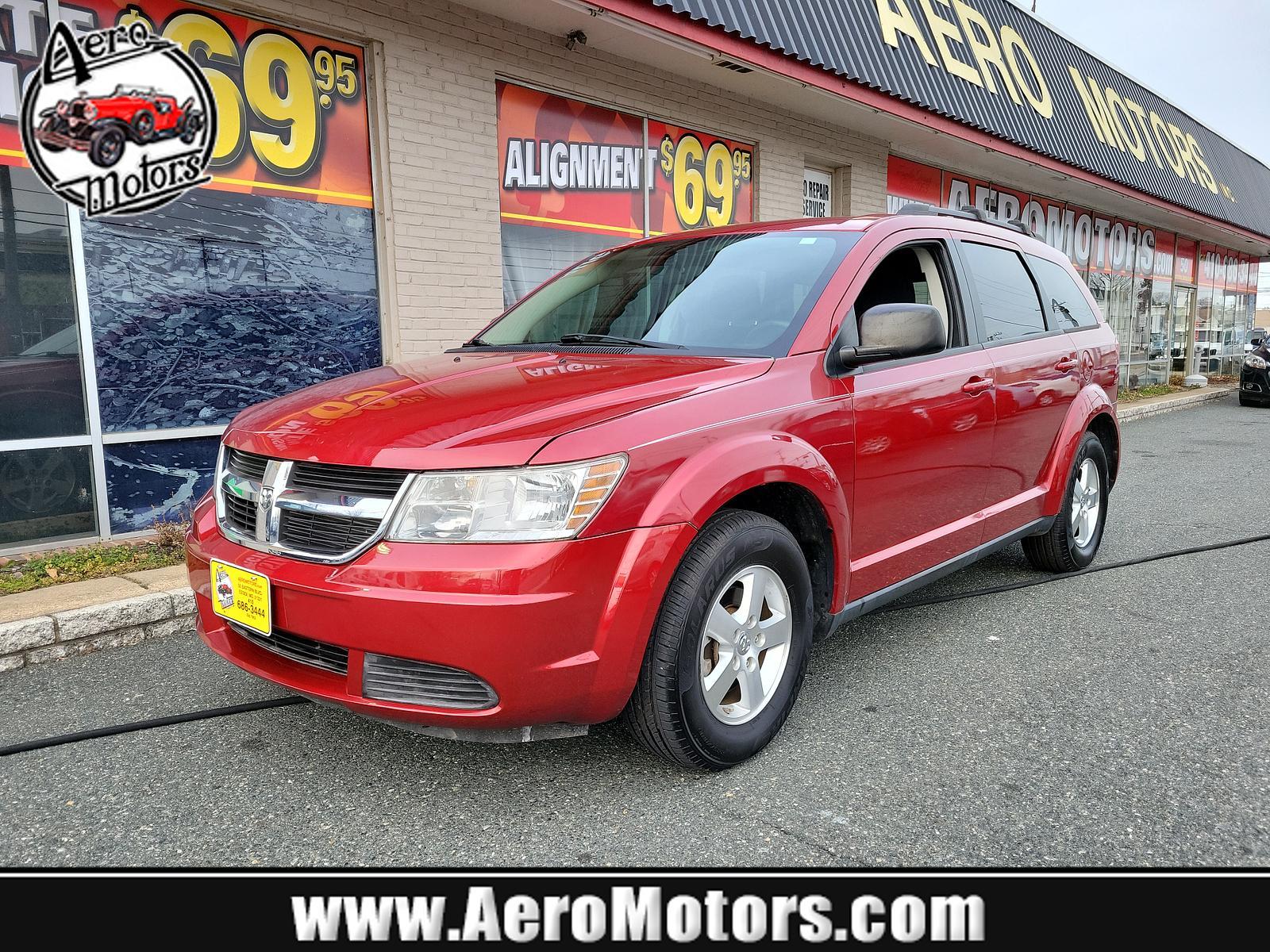 2010 Inferno Red Crystal Pearl /Dark Slate Gray Dodge Journey SE (3D4PG4FB1AT) with an 2.4L DOHC DUAL VVT 16-VALVE I4 ENGINE engine, located at 50 Eastern Blvd., Essex, MD, 21221, (410) 686-3444, 39.304367, -76.484947 - <p>Climb inside this versatile 2010 Dodge Journey SE in Inferno Red Crystal Pearl that is the ideal balance of a minivan, station wagon, and family sedan. Powered by a 2.4 Liter 4 Cylinder generating 173hp connected to a 4 Speed Automatic transmission. You will enjoy plenty of power to merge and pas - Photo #0