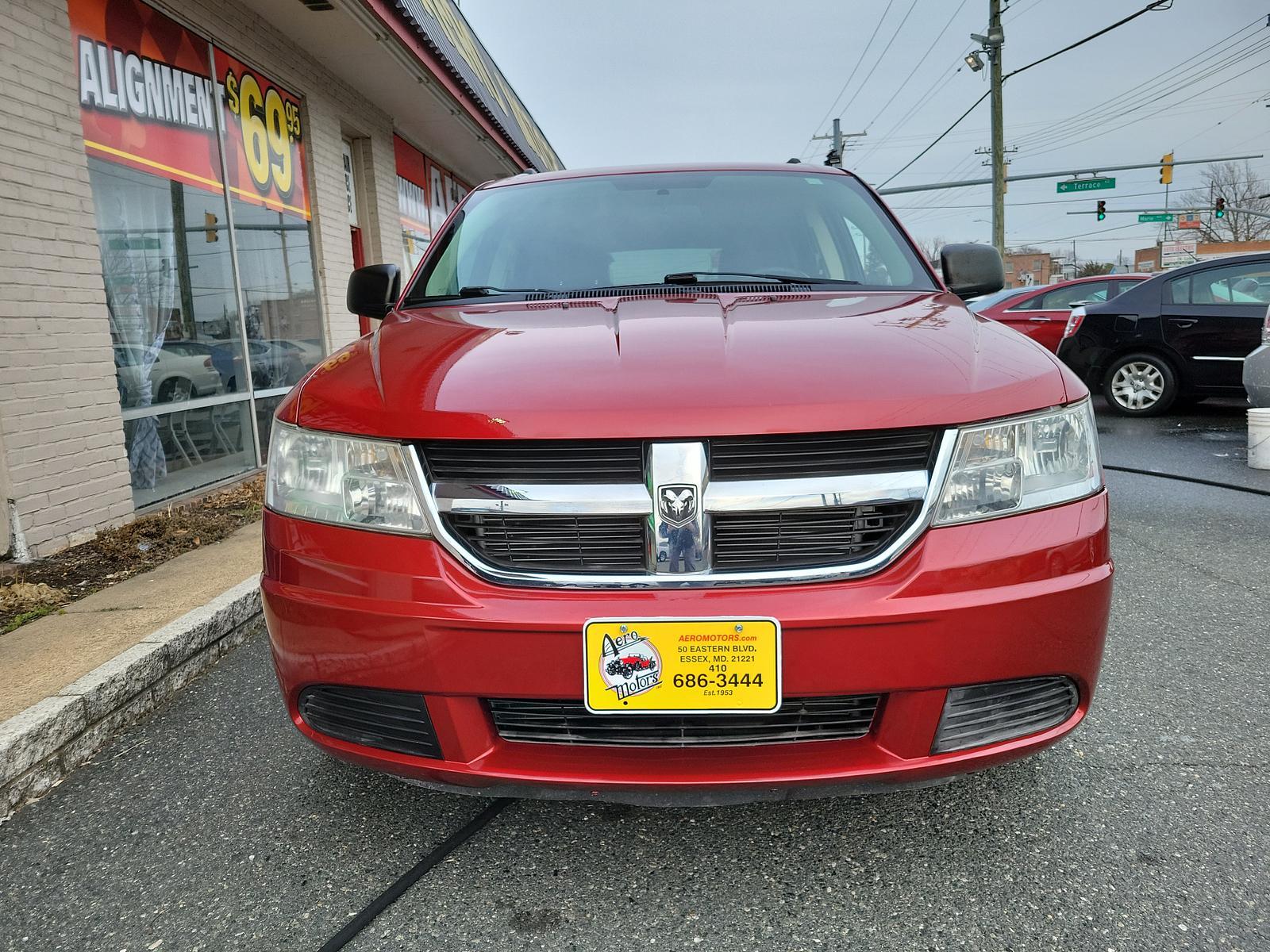 2010 Inferno Red Crystal Pearl /Dark Slate Gray Dodge Journey SE (3D4PG4FB1AT) with an 2.4L DOHC DUAL VVT 16-VALVE I4 ENGINE engine, located at 50 Eastern Blvd., Essex, MD, 21221, (410) 686-3444, 39.304367, -76.484947 - <p>Climb inside this versatile 2010 Dodge Journey SE in Inferno Red Crystal Pearl that is the ideal balance of a minivan, station wagon, and family sedan. Powered by a 2.4 Liter 4 Cylinder generating 173hp connected to a 4 Speed Automatic transmission. You will enjoy plenty of power to merge and pas - Photo #1
