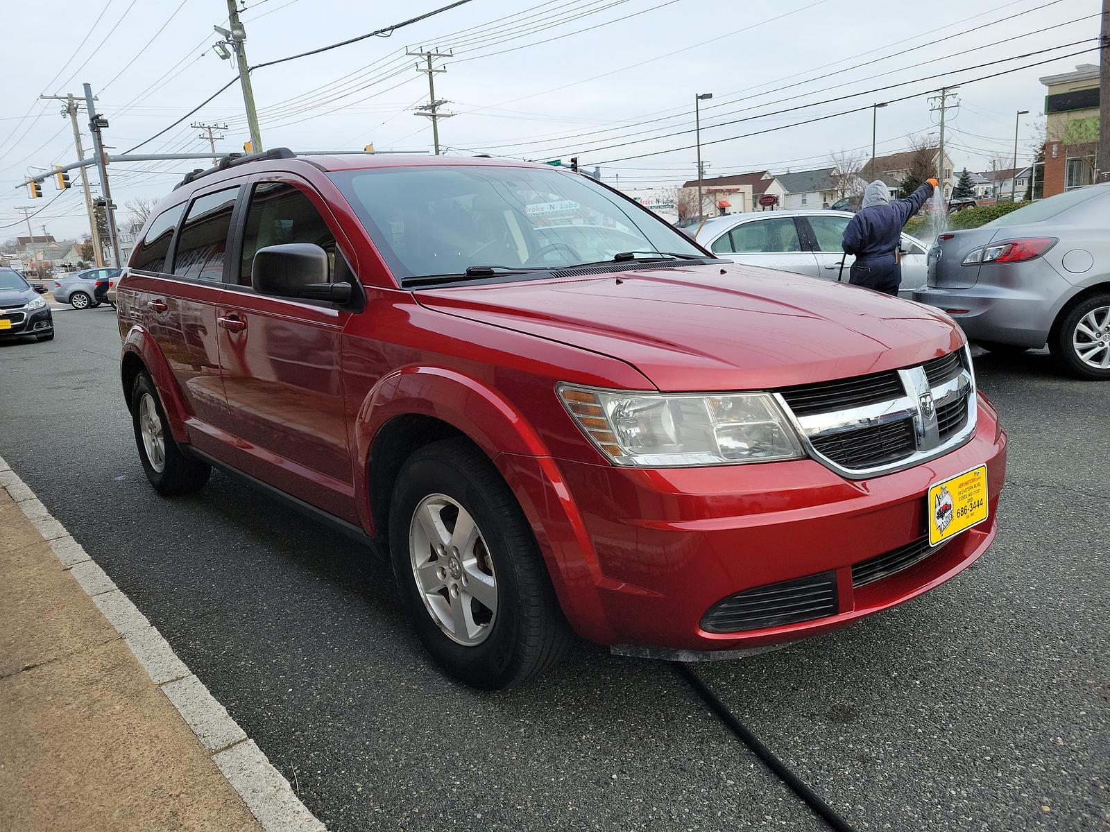 2010 Inferno Red Crystal Pearl /Dark Slate Gray Dodge Journey SE (3D4PG4FB1AT) with an 2.4L DOHC DUAL VVT 16-VALVE I4 ENGINE engine, located at 50 Eastern Blvd., Essex, MD, 21221, (410) 686-3444, 39.304367, -76.484947 - <p>Climb inside this versatile 2010 Dodge Journey SE in Inferno Red Crystal Pearl that is the ideal balance of a minivan, station wagon, and family sedan. Powered by a 2.4 Liter 4 Cylinder generating 173hp connected to a 4 Speed Automatic transmission. You will enjoy plenty of power to merge and pas - Photo #2