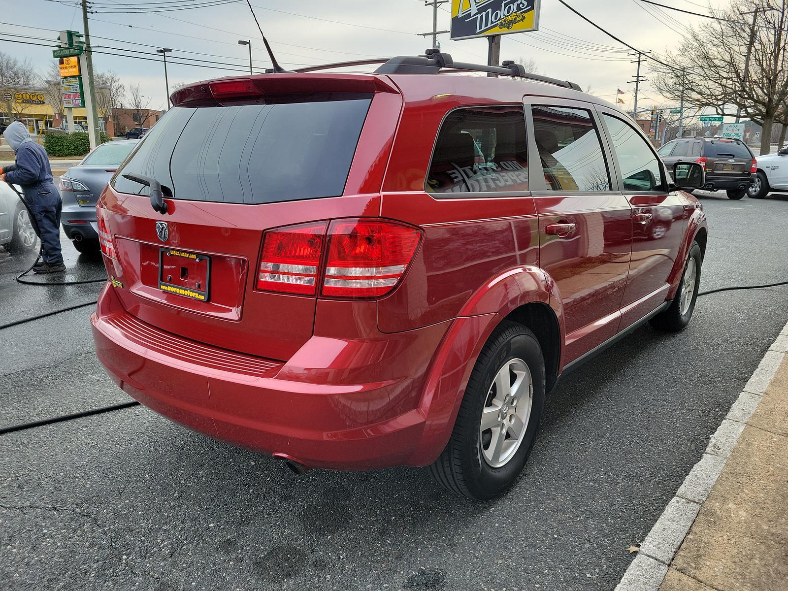 2010 Inferno Red Crystal Pearl /Dark Slate Gray Dodge Journey SE (3D4PG4FB1AT) with an 2.4L DOHC DUAL VVT 16-VALVE I4 ENGINE engine, located at 50 Eastern Blvd., Essex, MD, 21221, (410) 686-3444, 39.304367, -76.484947 - <p>Climb inside this versatile 2010 Dodge Journey SE in Inferno Red Crystal Pearl that is the ideal balance of a minivan, station wagon, and family sedan. Powered by a 2.4 Liter 4 Cylinder generating 173hp connected to a 4 Speed Automatic transmission. You will enjoy plenty of power to merge and pas - Photo #3