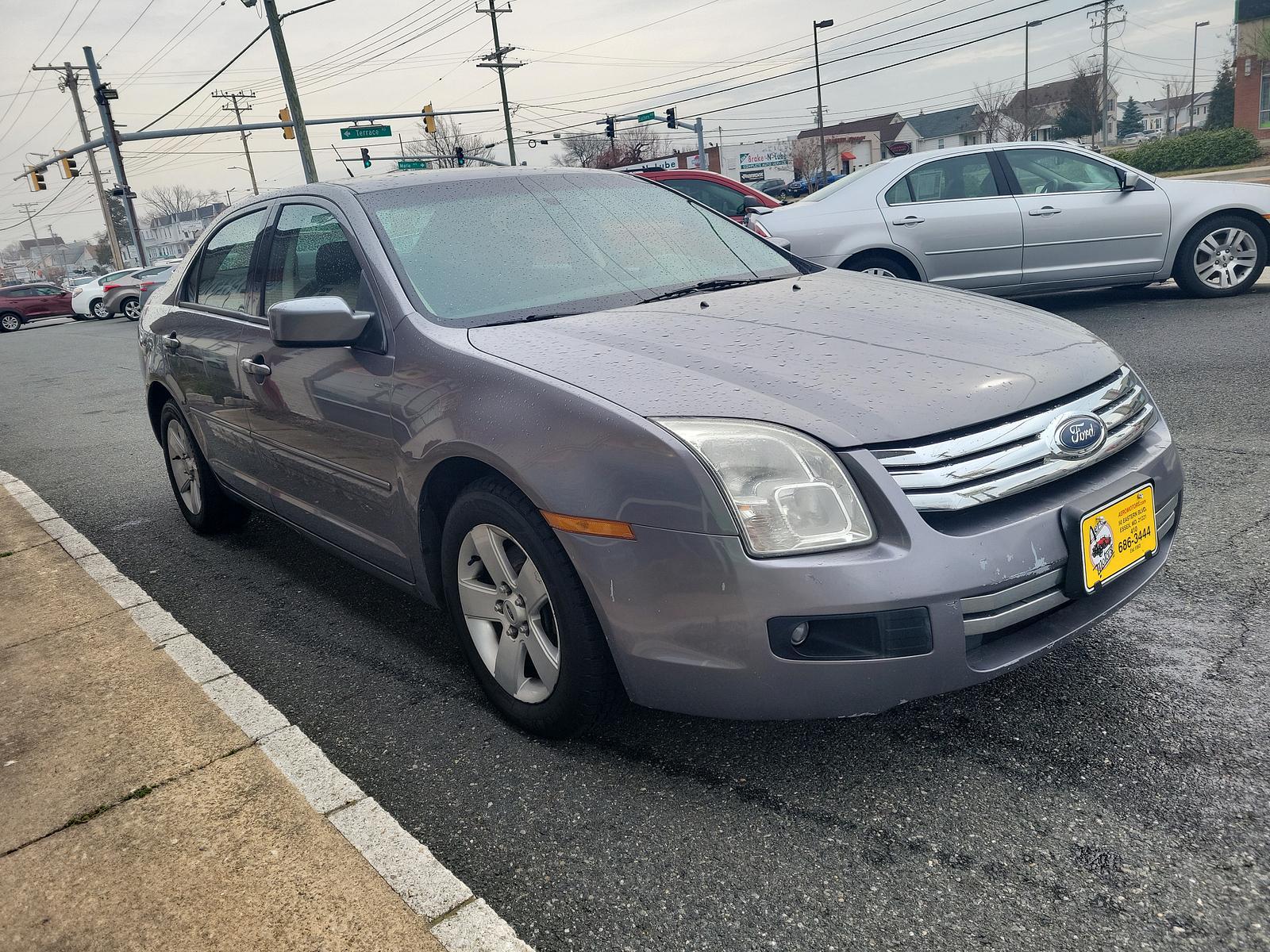 2007 Tungsten Silver Metallic - T8 /Charcoal - W Ford Fusion SE (3FAHP07Z37R) with an 2.3L 16V I4 DURATEC ENGINE engine, located at 50 Eastern Blvd., Essex, MD, 21221, (410) 686-3444, 39.304367, -76.484947 - <p>This 2007 Ford Fusion SE Sedan in Tungsten Silver Metallic is ready to make you smile. Powered by a 2.3 Liter 4 Cylinder generating 160hp while connected to a 5 Speed Automatic transmission. Driving this sleek Front Wheel Drive Sedan, you can secure up to 31mpg on the highway. </p><p><br></p><p>T - Photo #2