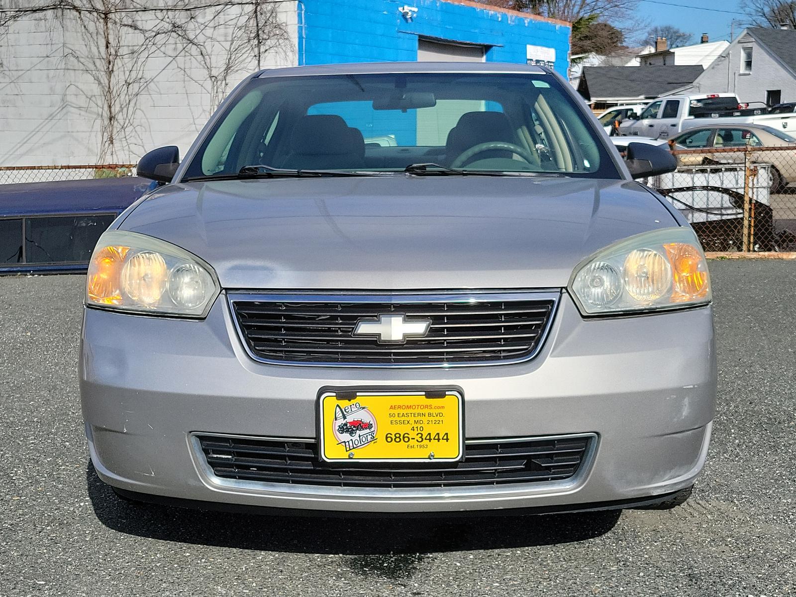 2007 Silverstone Metallic - 67U /Titanium - 83 Chevrolet Malibu LS w/1LS (1G1ZS58F77F) with an ENGINE, ECOTEC 2.2L DOHC 16-VALVE 4-CYLINDER MFI engine, located at 50 Eastern Blvd., Essex, MD, 21221, (410) 686-3444, 39.304367, -76.484947 - <p>You're going to love our great looking 2007 Chevrolet Malibu LS Sedan presented in Silverstone Metallic. Powered by a 3.1 Liter V6 that offers 150hp while paired with an Automatic transmission for smooth shifts. This Front Wheel Drive combination can handle most road conditions and rewards you wi - Photo #1