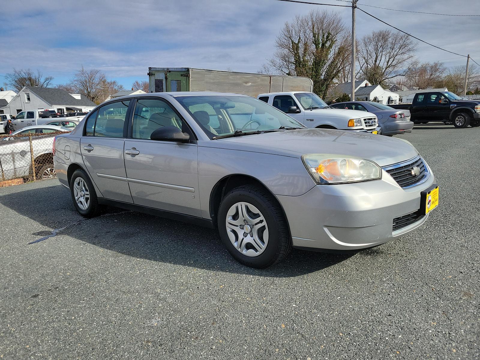 2007 Silverstone Metallic - 67U /Titanium - 83 Chevrolet Malibu LS w/1LS (1G1ZS58F77F) with an ENGINE, ECOTEC 2.2L DOHC 16-VALVE 4-CYLINDER MFI engine, located at 50 Eastern Blvd., Essex, MD, 21221, (410) 686-3444, 39.304367, -76.484947 - <p>You're going to love our great looking 2007 Chevrolet Malibu LS Sedan presented in Silverstone Metallic. Powered by a 3.1 Liter V6 that offers 150hp while paired with an Automatic transmission for smooth shifts. This Front Wheel Drive combination can handle most road conditions and rewards you wi - Photo #2