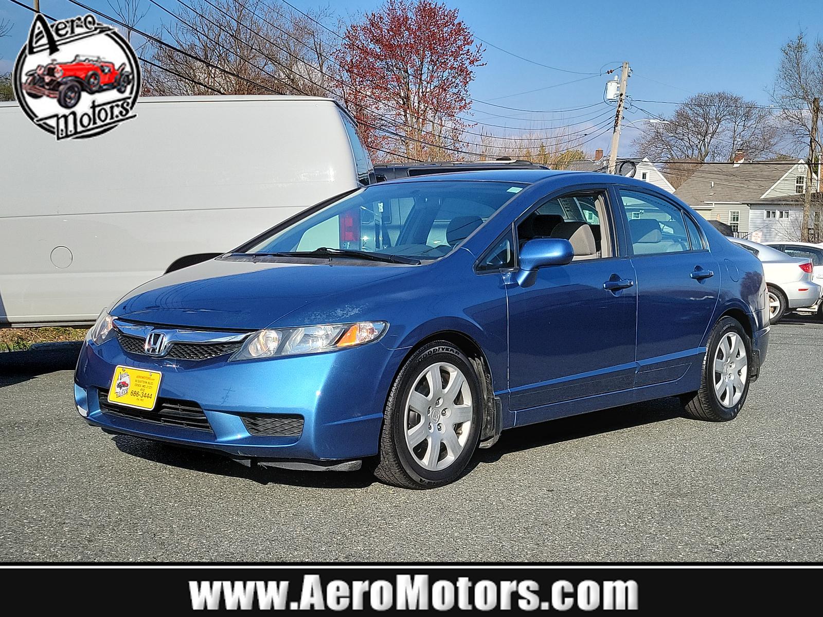2009 Atomic Blue Metallic - BL /Gray - GR Honda Civic Sdn LX (2HGFA16539H) with an 1.8L SOHC MPFI 16-valve i-VTEC I4 engine engine, located at 50 Eastern Blvd., Essex, MD, 21221, (410) 686-3444, 39.304367, -76.484947 - <p>Our 2009 Honda Civic LX Sedan presented in Atomic Blue Metallic takes your drive to the next level! Powered by a 1.8 Liter 4 Cylinder offering 140hp paired to a 5 Speed Automatic transmission for fantastic passing authority. This Front Wheel Drive sedan rewards you with nearly 36mpg on the highwa - Photo #0