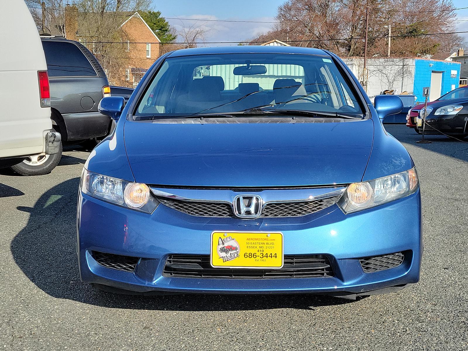 2009 Atomic Blue Metallic - BL /Gray - GR Honda Civic Sdn LX (2HGFA16539H) with an 1.8L SOHC MPFI 16-valve i-VTEC I4 engine engine, located at 50 Eastern Blvd., Essex, MD, 21221, (410) 686-3444, 39.304367, -76.484947 - <p>Our 2009 Honda Civic LX Sedan presented in Atomic Blue Metallic takes your drive to the next level! Powered by a 1.8 Liter 4 Cylinder offering 140hp paired to a 5 Speed Automatic transmission for fantastic passing authority. This Front Wheel Drive sedan rewards you with nearly 36mpg on the highwa - Photo #1