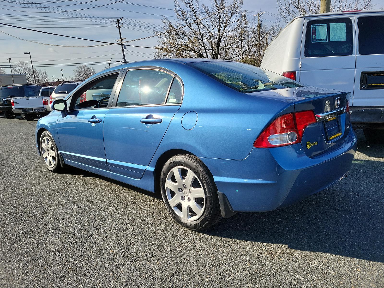 2009 Atomic Blue Metallic - BL /Gray - GR Honda Civic Sdn LX (2HGFA16539H) with an 1.8L SOHC MPFI 16-valve i-VTEC I4 engine engine, located at 50 Eastern Blvd., Essex, MD, 21221, (410) 686-3444, 39.304367, -76.484947 - <p>Our 2009 Honda Civic LX Sedan presented in Atomic Blue Metallic takes your drive to the next level! Powered by a 1.8 Liter 4 Cylinder offering 140hp paired to a 5 Speed Automatic transmission for fantastic passing authority. This Front Wheel Drive sedan rewards you with nearly 36mpg on the highwa - Photo #5