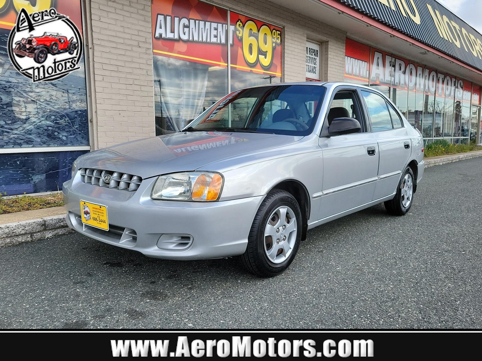 2000 Silver Mist - CS /Gray - LT Hyundai Accent GL (KMHCG45G5YU) with an 1.5L SOHC MPI 12 valve 4 cyl engine engine, located at 50 Eastern Blvd., Essex, MD, 21221, (410) 686-3444, 39.304367, -76.484947 - <p>Our 2000 Hyundai Accent GL Sedan is a great car shown off in Silver Mist! Powered by a 1.6 Liter 4 Cylinder connected to a 4 Speed Automated transmission for easy passing commands. This Front Wheel Drive sedan provides up to 35mpg on the highway and handles well to make for a perfect commuter aro - Photo #0