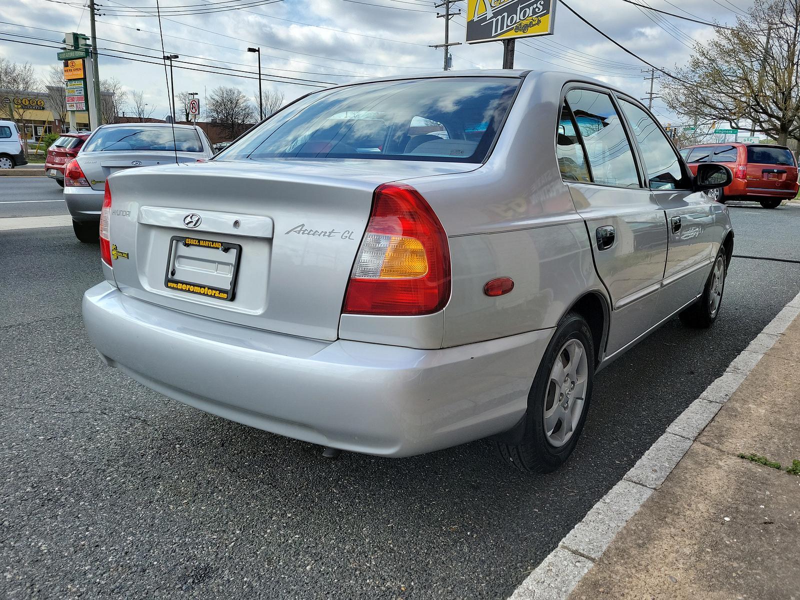 2000 Silver Mist - CS /Gray - LT Hyundai Accent GL (KMHCG45G5YU) with an 1.5L SOHC MPI 12 valve 4 cyl engine engine, located at 50 Eastern Blvd., Essex, MD, 21221, (410) 686-3444, 39.304367, -76.484947 - <p>Our 2000 Hyundai Accent GL Sedan is a great car shown off in Silver Mist! Powered by a 1.6 Liter 4 Cylinder connected to a 4 Speed Automated transmission for easy passing commands. This Front Wheel Drive sedan provides up to 35mpg on the highway and handles well to make for a perfect commuter aro - Photo #3