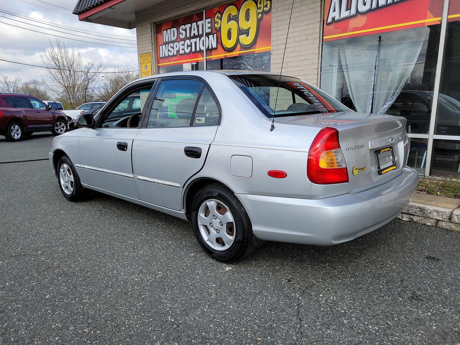 2000 Silver Mist - CS /Gray - LT Hyundai Accent GL (KMHCG45G5YU) with an 1.5L SOHC MPI 12 valve 4 cyl engine engine, located at 50 Eastern Blvd., Essex, MD, 21221, (410) 686-3444, 39.304367, -76.484947 - <p>Our 2000 Hyundai Accent GL Sedan is a great car shown off in Silver Mist! Powered by a 1.6 Liter 4 Cylinder connected to a 4 Speed Automated transmission for easy passing commands. This Front Wheel Drive sedan provides up to 35mpg on the highway and handles well to make for a perfect commuter aro - Photo #5