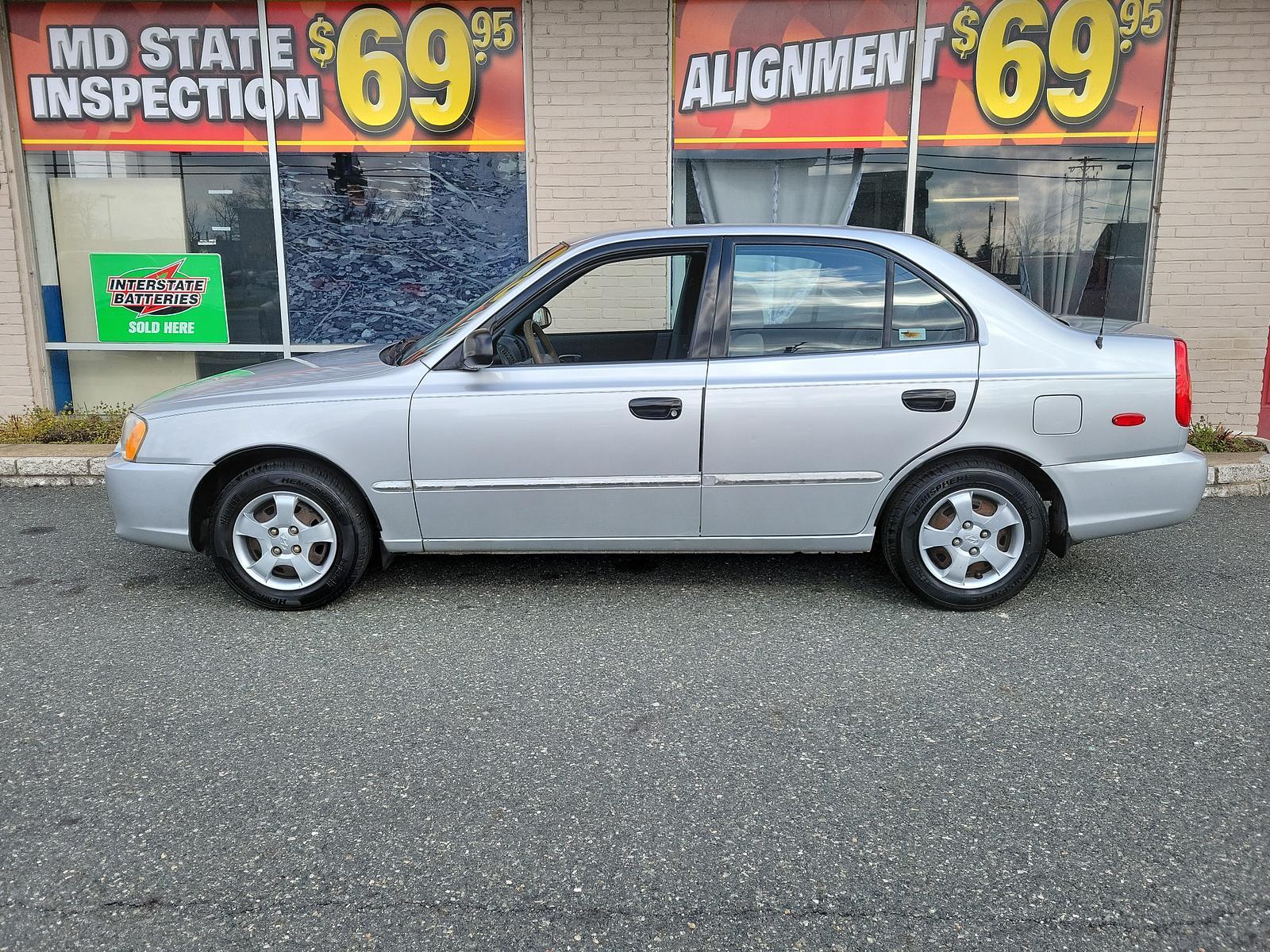 2000 Silver Mist - CS /Gray - LT Hyundai Accent GL (KMHCG45G5YU) with an 1.5L SOHC MPI 12 valve 4 cyl engine engine, located at 50 Eastern Blvd., Essex, MD, 21221, (410) 686-3444, 39.304367, -76.484947 - <p>Our 2000 Hyundai Accent GL Sedan is a great car shown off in Silver Mist! Powered by a 1.6 Liter 4 Cylinder connected to a 4 Speed Automated transmission for easy passing commands. This Front Wheel Drive sedan provides up to 35mpg on the highway and handles well to make for a perfect commuter aro - Photo #6