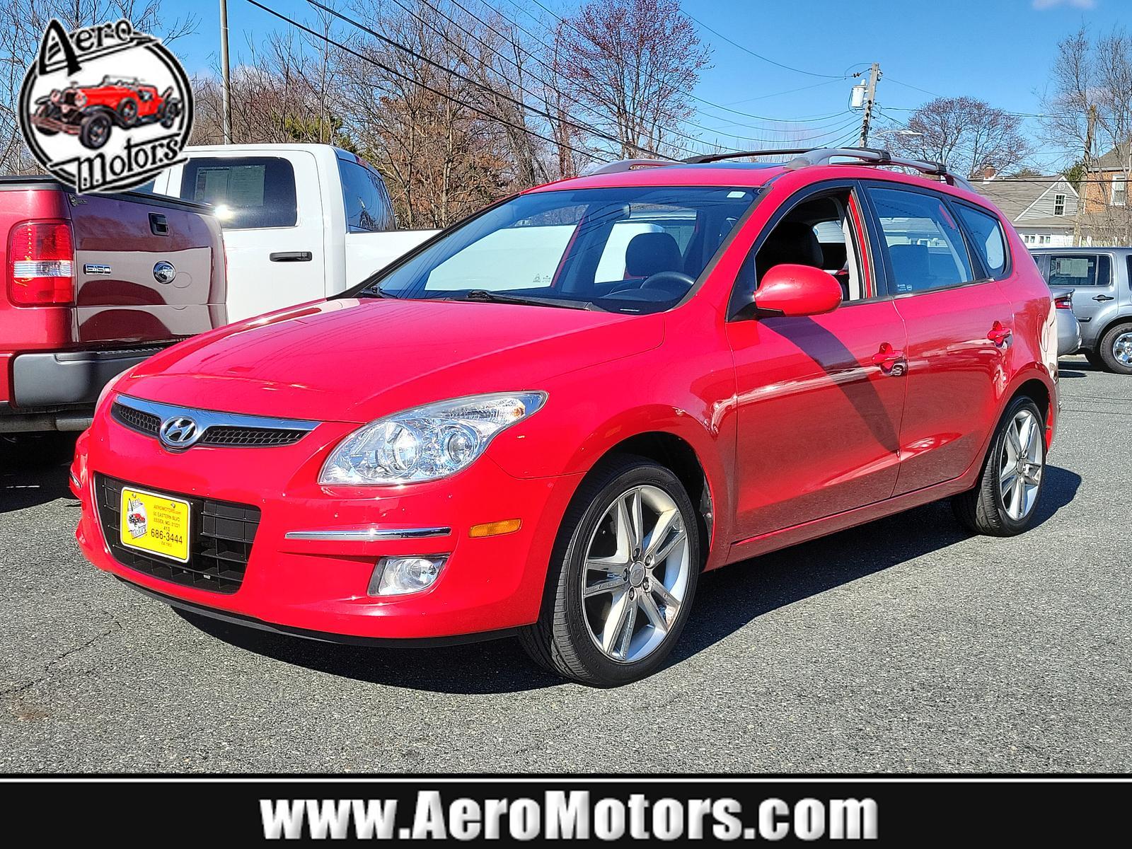 2011 Chilipepper Red - JA /Black - XP Hyundai Elantra Touring SE (KMHDC8AEXBU) with an 2.0L DOHC CVVT 16-valve I4 engine engine, located at 50 Eastern Blvd., Essex, MD, 21221, (410) 686-3444, 39.304367, -76.484947 - <p>Our 2011 Hyundai Elantra Touring SE Hatchback is offered in a unique Chili Pepper Red exterior finish. Powered by a 2.0 Liter 4 Cylinder that offers 138hp paired to a 4 Speed Automatic transmission wh SHIFTRONIC. Together, this Front Wheel Drive hatchback makes the drive entertaining and enjoyabl - Photo #0