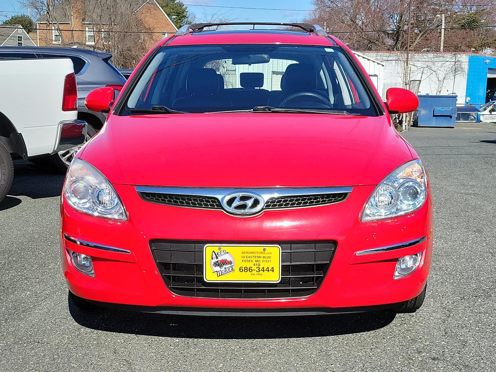 2011 Chilipepper Red - JA /Black - XP Hyundai Elantra Touring SE (KMHDC8AEXBU) with an 2.0L DOHC CVVT 16-valve I4 engine engine, located at 50 Eastern Blvd., Essex, MD, 21221, (410) 686-3444, 39.304367, -76.484947 - <p>Our 2011 Hyundai Elantra Touring SE Hatchback is offered in a unique Chili Pepper Red exterior finish. Powered by a 2.0 Liter 4 Cylinder that offers 138hp paired to a 4 Speed Automatic transmission wh SHIFTRONIC. Together, this Front Wheel Drive hatchback makes the drive entertaining and enjoyabl - Photo #1