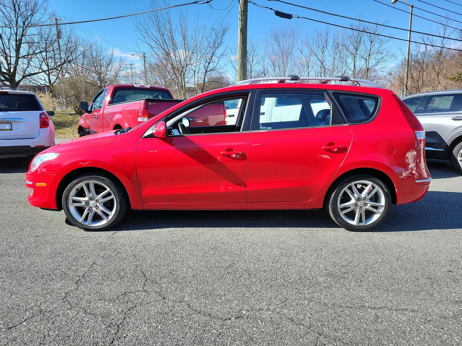 2011 Chilipepper Red - JA /Black - XP Hyundai Elantra Touring SE (KMHDC8AEXBU) with an 2.0L DOHC CVVT 16-valve I4 engine engine, located at 50 Eastern Blvd., Essex, MD, 21221, (410) 686-3444, 39.304367, -76.484947 - <p>Our 2011 Hyundai Elantra Touring SE Hatchback is offered in a unique Chili Pepper Red exterior finish. Powered by a 2.0 Liter 4 Cylinder that offers 138hp paired to a 4 Speed Automatic transmission wh SHIFTRONIC. Together, this Front Wheel Drive hatchback makes the drive entertaining and enjoyabl - Photo #6