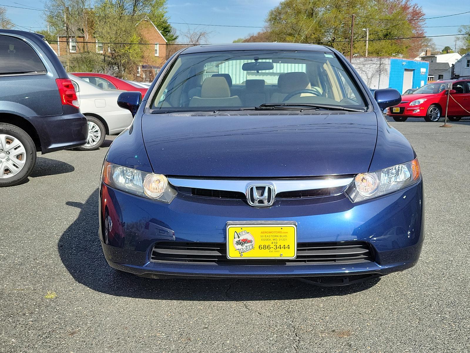 2006 Atomic Blue Metallic - BB /Ivory - IV Honda Civic Sdn EX (1HGFA16896L) with an 1.8L SOHC MPFI 16-valve i-VTEC I4 engine engine, located at 50 Eastern Blvd., Essex, MD, 21221, (410) 686-3444, 39.304367, -76.484947 - <p>Indulge yourself with our fantastic 2006 Honda Civic EX Sedan proudly displayed in Silver. Powered by an efficient 1.8 Liter 4 Cylinder offering 140hp blended with a responsive 5 Speed Automatic transmission for easy passing. This Front Wheel Drive sedan scores near 36mpg on the open road. On the - Photo #1