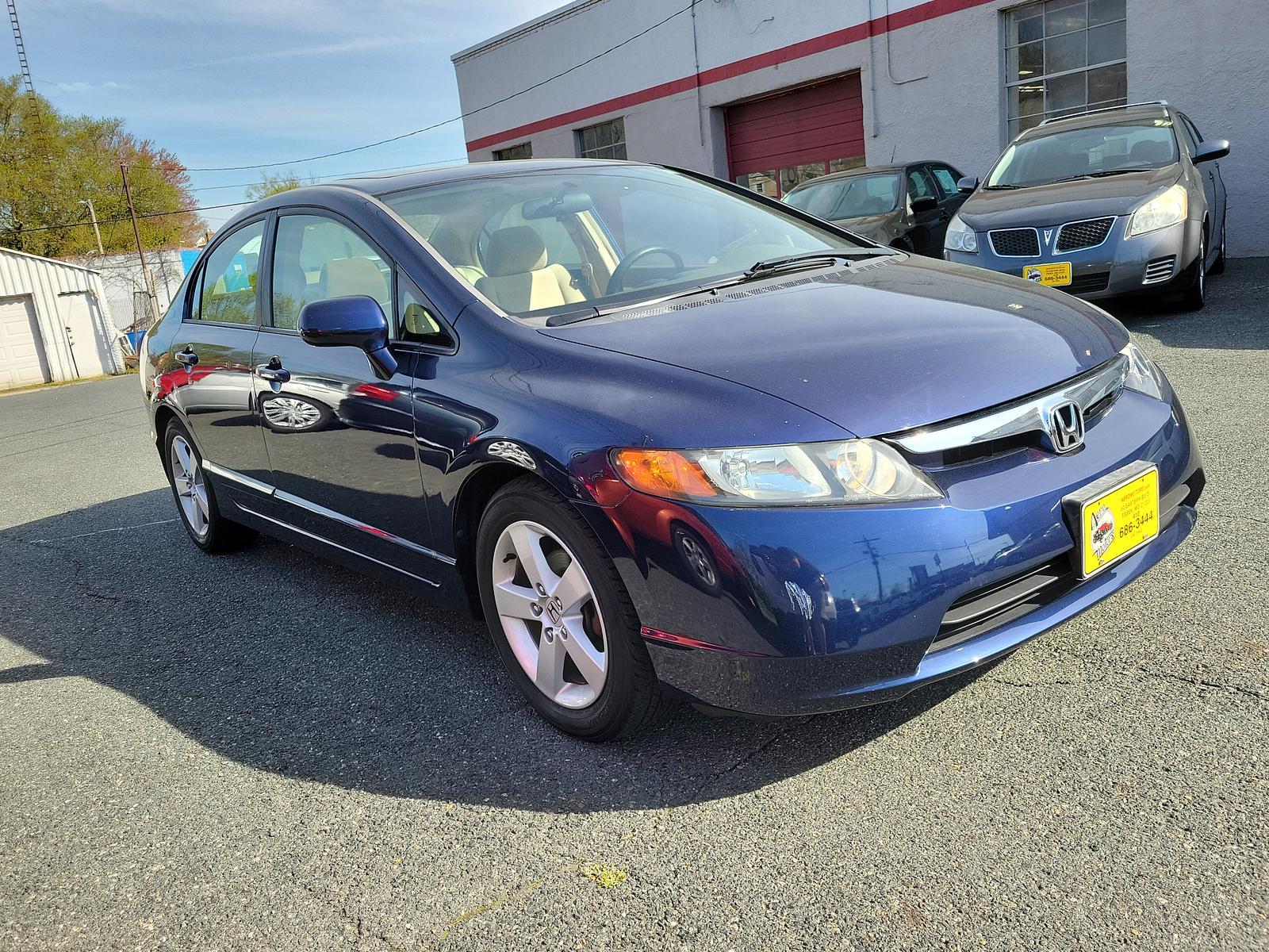 2006 Atomic Blue Metallic - BB /Ivory - IV Honda Civic Sdn EX (1HGFA16896L) with an 1.8L SOHC MPFI 16-valve i-VTEC I4 engine engine, located at 50 Eastern Blvd., Essex, MD, 21221, (410) 686-3444, 39.304367, -76.484947 - <p>Indulge yourself with our fantastic 2006 Honda Civic EX Sedan proudly displayed in Silver. Powered by an efficient 1.8 Liter 4 Cylinder offering 140hp blended with a responsive 5 Speed Automatic transmission for easy passing. This Front Wheel Drive sedan scores near 36mpg on the open road. On the - Photo #2
