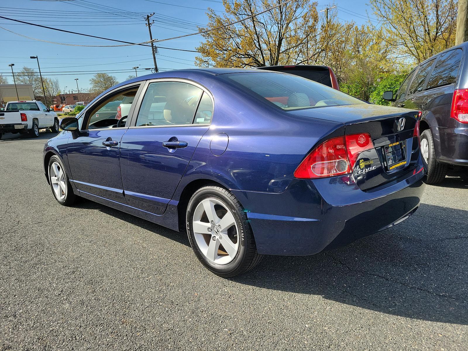 2006 Atomic Blue Metallic - BB /Ivory - IV Honda Civic Sdn EX (1HGFA16896L) with an 1.8L SOHC MPFI 16-valve i-VTEC I4 engine engine, located at 50 Eastern Blvd., Essex, MD, 21221, (410) 686-3444, 39.304367, -76.484947 - <p>Indulge yourself with our fantastic 2006 Honda Civic EX Sedan proudly displayed in Silver. Powered by an efficient 1.8 Liter 4 Cylinder offering 140hp blended with a responsive 5 Speed Automatic transmission for easy passing. This Front Wheel Drive sedan scores near 36mpg on the open road. On the - Photo #5