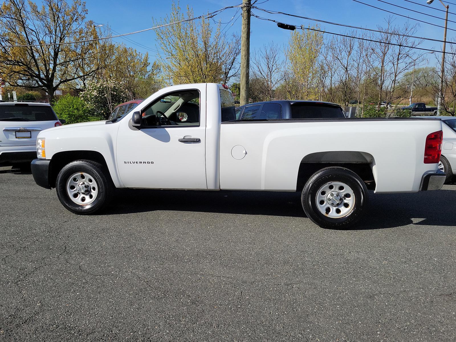 2011 Summit White - 50U /Dark Titanium - 88B Chevrolet Silverado 1500 Work Truck (1GCNKPEA9BZ) with an ENGINE, VORTEC 4.8L VARIABLE VALVE TIMING V8 SFI FLEXFUEL engine, located at 50 Eastern Blvd., Essex, MD, 21221, (410) 686-3444, 39.304367, -76.484947 - <p>Admire our great looking 2011 Chevrolet Silverado 1500 W/T Regular Cab 4X4 presented in Summit White. Powered by a 5.3 Liter V8 delivering 315hp while paired to a durable Automatic transmission for easy towing. This Four Wheel Drive will meet all your hauling and towing needs and looks good while - Photo #6