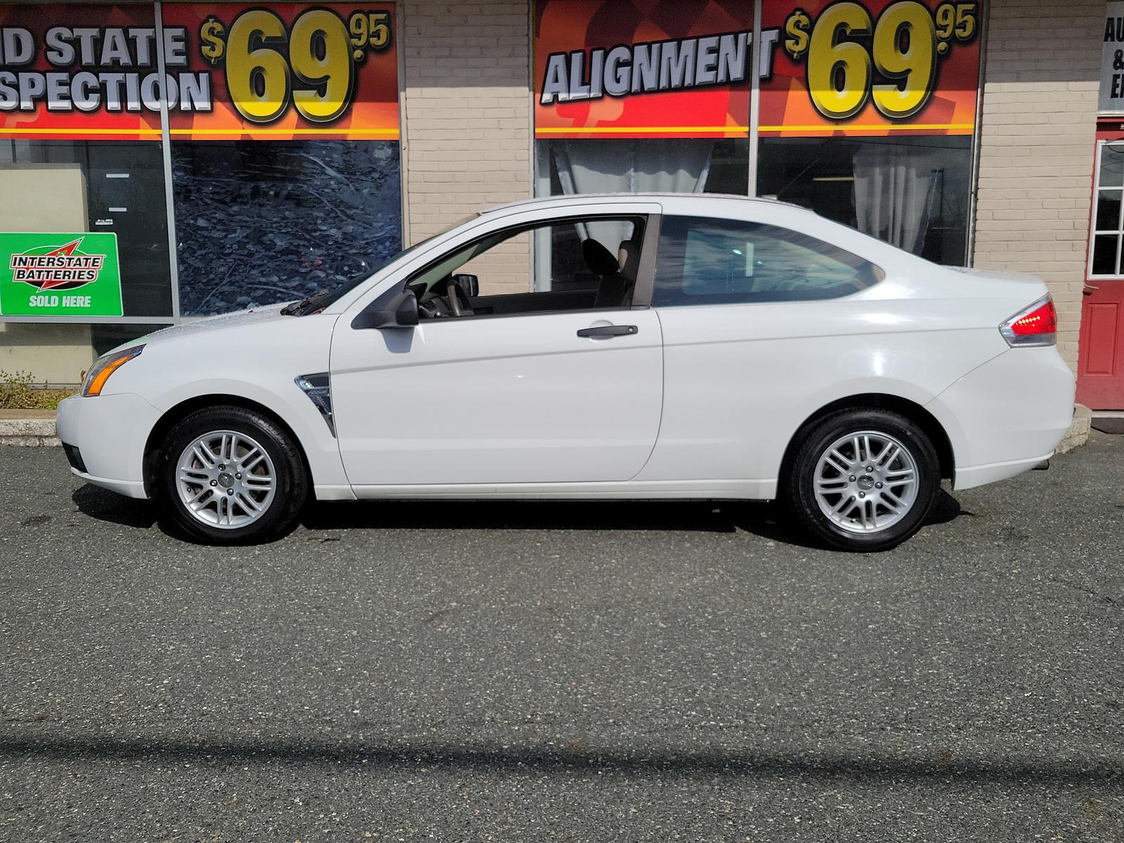 2008 Oxford White - YZ /Medium Stone - S Ford Focus SE (1FAHP33N48W) with an 2.0L DOHC 16-VALVE I4 DURATEC ENGINE engine, located at 50 Eastern Blvd., Essex, MD, 21221, (410) 686-3444, 39.304367, -76.484947 - <p>This 2008 Ford Focus SE Coupe shown in Oxford White should be on your shortlist. Powered by a 2.0 Liter 4 Cylinder that generates 132hp while combined with an Automatic transmission. This Front Wheel Drive accelerates briskly and loves to show the pep in its step while scoring near 35mpg on the h - Photo #6