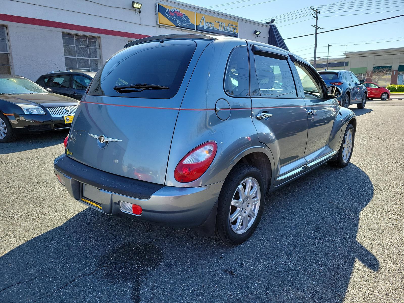 2010 Silver Steel Metallic - PA4 /Pastel slate gray - A8DA Chrysler PT Cruiser Classic (3A4GY5F95AT) with an 2.4L DOHC SMPI 16-VALVE I4 ENGINE engine, located at 50 Eastern Blvd., Essex, MD, 21221, (410) 686-3444, 39.304367, -76.484947 - <p>The best in retro styling, introducing our Chrysler 2010 PT Cruiser Classic Wagon with the Convenience Group showcased in Silver Steel Metallic. Powered by a 2.4 Liter 4 Cylinder generating 150hp paired to a smooth shifting 4 Speed Automatic transmission. This Front Wheel Drive wagon earns nearly - Photo #3