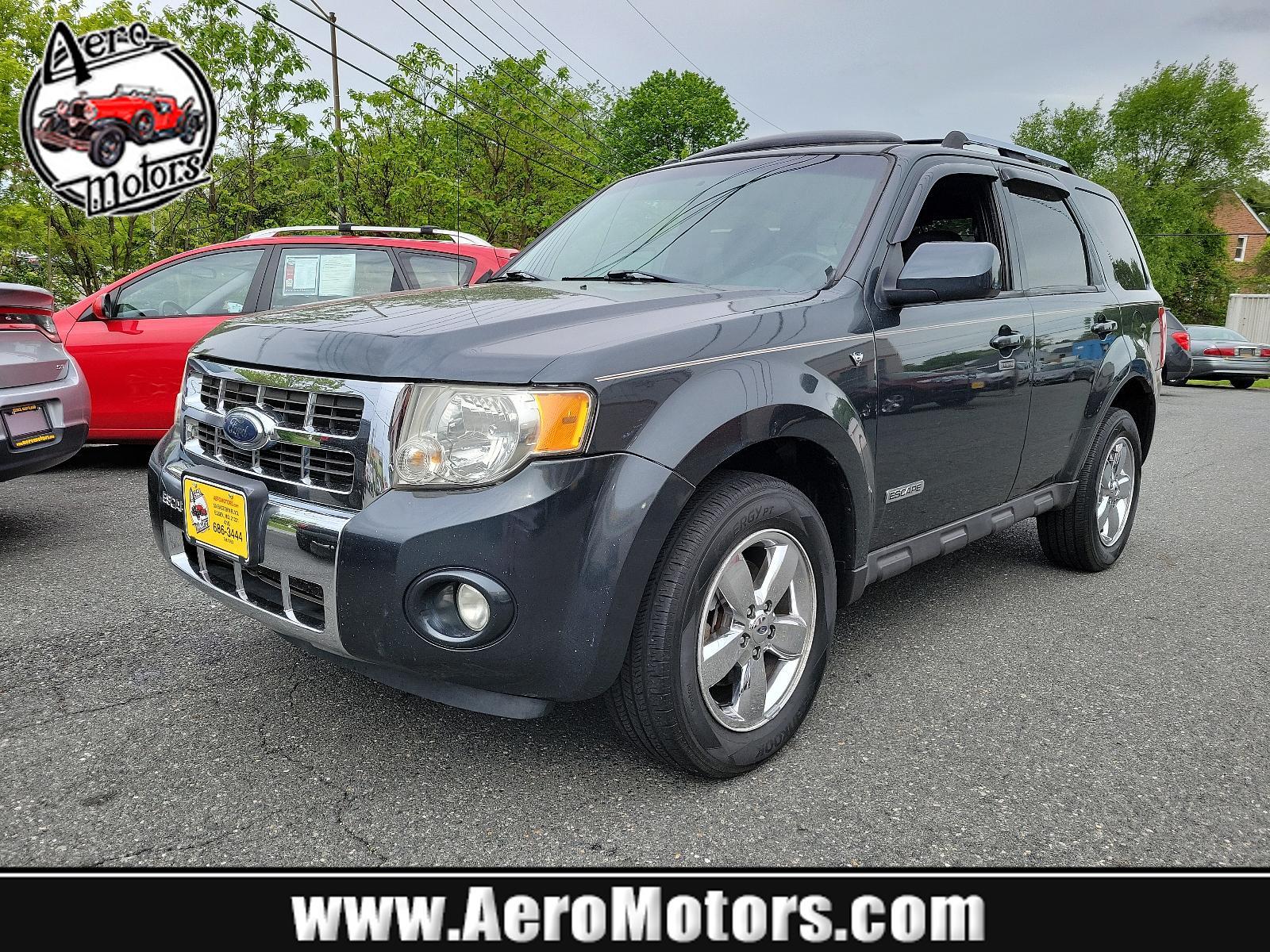 2008 Black Pearl Slate - T9 /Charcoal Black - 9 Ford Escape Limited (1FMCU94158K) with an 3.0L DOHC SEFI 24-VALVE V6 DURATEC ENGINE engine, located at 50 Eastern Blvd., Essex, MD, 21221, (410) 686-3444, 39.304367, -76.484947 - <p>A terrific blend of handling, style, and utility, our 2008 Ford Escape Limited 4X4 in Black Pearl Slate is an excellent choice for your transportation needs! Powered by a potent 3.0 Liter V6 that delivers 200hp while paired with a 4 Speed Automatic transmission for easy passing power. This nimble - Photo #0