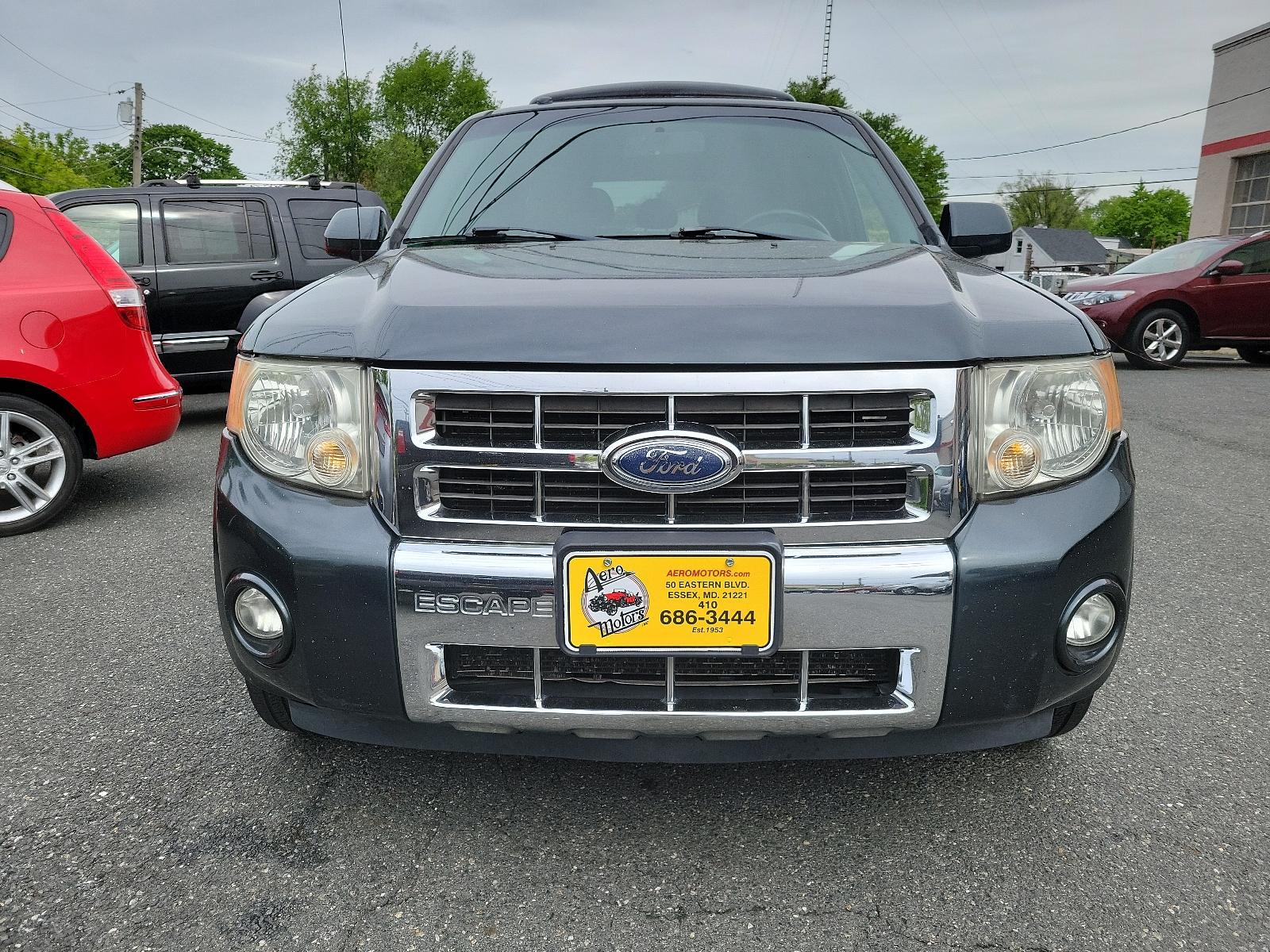 2008 Black Pearl Slate - T9 /Charcoal Black - 9 Ford Escape Limited (1FMCU94158K) with an 3.0L DOHC SEFI 24-VALVE V6 DURATEC ENGINE engine, located at 50 Eastern Blvd., Essex, MD, 21221, (410) 686-3444, 39.304367, -76.484947 - <p>A terrific blend of handling, style, and utility, our 2008 Ford Escape Limited 4X4 in Black Pearl Slate is an excellent choice for your transportation needs! Powered by a potent 3.0 Liter V6 that delivers 200hp while paired with a 4 Speed Automatic transmission for easy passing power. This nimble - Photo #1