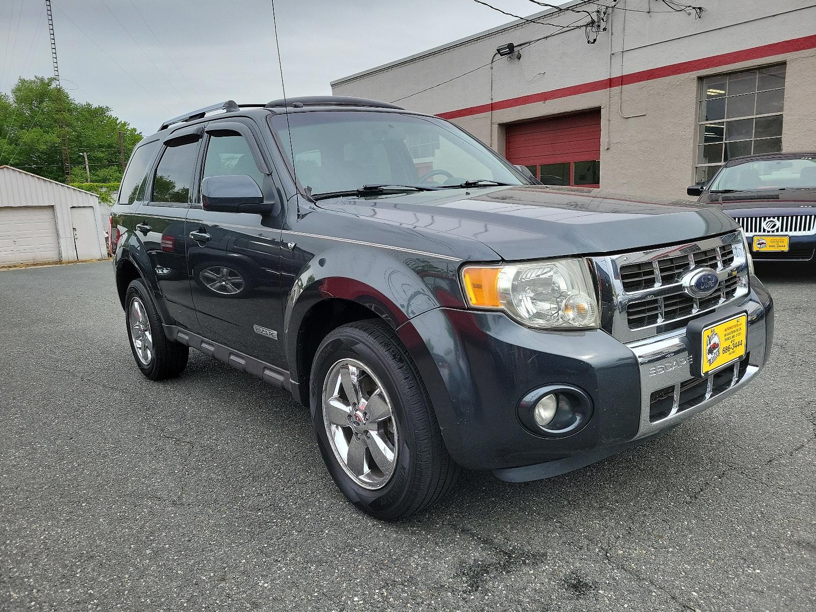 2008 Black Pearl Slate - T9 /Charcoal Black - 9 Ford Escape Limited (1FMCU94158K) with an 3.0L DOHC SEFI 24-VALVE V6 DURATEC ENGINE engine, located at 50 Eastern Blvd., Essex, MD, 21221, (410) 686-3444, 39.304367, -76.484947 - <p>A terrific blend of handling, style, and utility, our 2008 Ford Escape Limited 4X4 in Black Pearl Slate is an excellent choice for your transportation needs! Powered by a potent 3.0 Liter V6 that delivers 200hp while paired with a 4 Speed Automatic transmission for easy passing power. This nimble - Photo #2