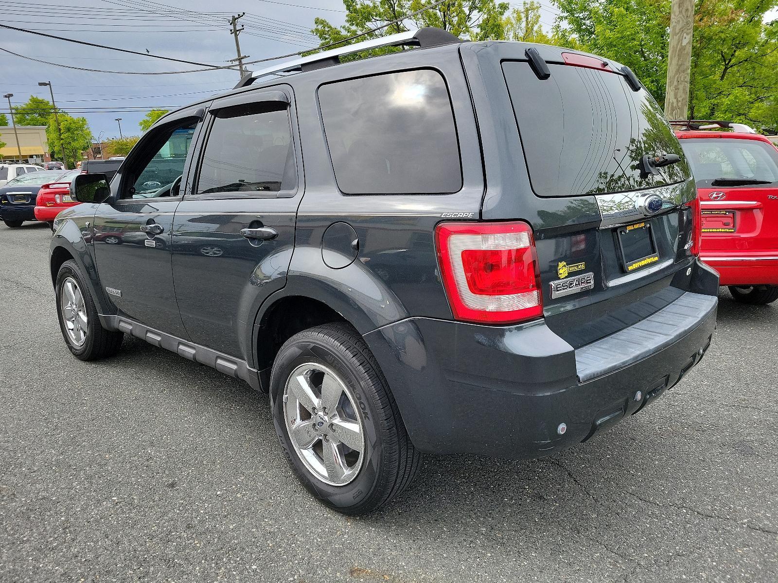 2008 Black Pearl Slate - T9 /Charcoal Black - 9 Ford Escape Limited (1FMCU94158K) with an 3.0L DOHC SEFI 24-VALVE V6 DURATEC ENGINE engine, located at 50 Eastern Blvd., Essex, MD, 21221, (410) 686-3444, 39.304367, -76.484947 - <p>A terrific blend of handling, style, and utility, our 2008 Ford Escape Limited 4X4 in Black Pearl Slate is an excellent choice for your transportation needs! Powered by a potent 3.0 Liter V6 that delivers 200hp while paired with a 4 Speed Automatic transmission for easy passing power. This nimble - Photo #5