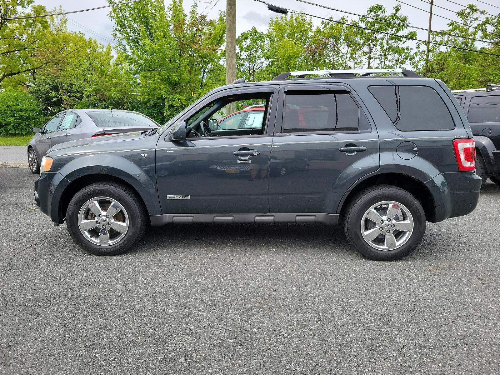 2008 Black Pearl Slate - T9 /Charcoal Black - 9 Ford Escape Limited (1FMCU94158K) with an 3.0L DOHC SEFI 24-VALVE V6 DURATEC ENGINE engine, located at 50 Eastern Blvd., Essex, MD, 21221, (410) 686-3444, 39.304367, -76.484947 - <p>A terrific blend of handling, style, and utility, our 2008 Ford Escape Limited 4X4 in Black Pearl Slate is an excellent choice for your transportation needs! Powered by a potent 3.0 Liter V6 that delivers 200hp while paired with a 4 Speed Automatic transmission for easy passing power. This nimble - Photo #6