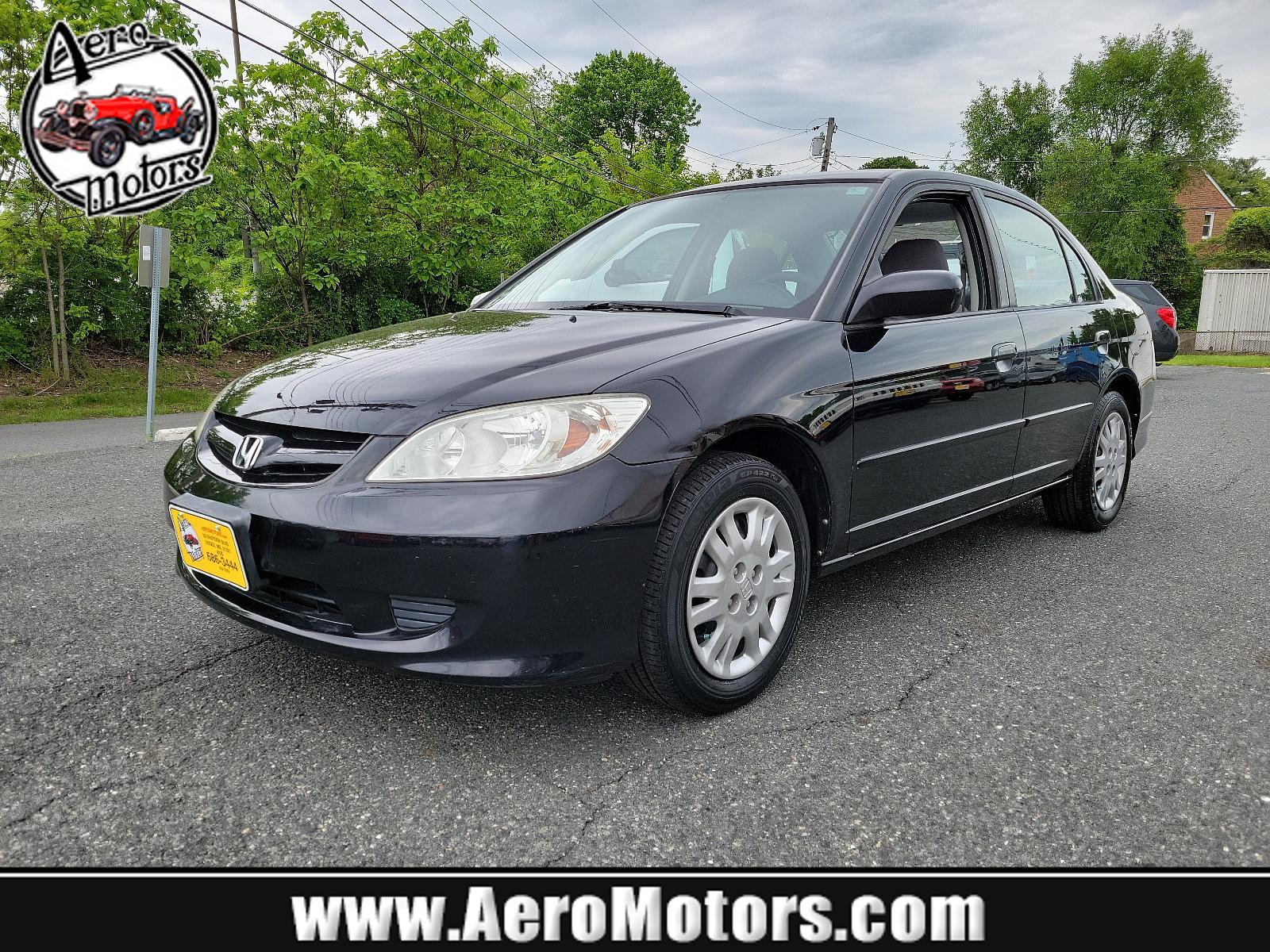 2005 Nighthawk Black Pearl - BK /Gray - GR Honda Civic Sdn LX (JHMES16525S) with an 1.7L SOHC MPFI 16-valve I4 engine engine, located at 50 Eastern Blvd., Essex, MD, 21221, (410) 686-3444, 39.304367, -76.484947 - <p>Practical, efficient, and fun to drive, this 2005 Honda Civic LX Sedan in Nighthawk Black Pearl lives up to its reputation! Powered by a 1.7 Liter 4 Cylinder generating 115hp while connected to the 5 Speed Manual transmission to make the most out of every mile. One trip in our Front Wheel Drive H - Photo #0