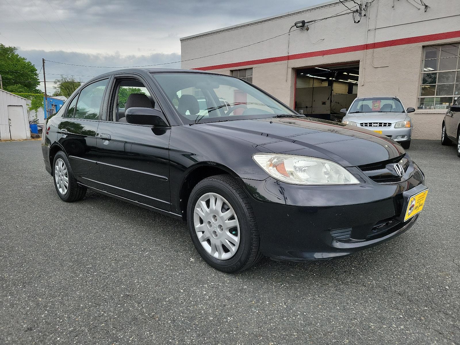 2005 Nighthawk Black Pearl - BK /Gray - GR Honda Civic Sdn LX (JHMES16525S) with an 1.7L SOHC MPFI 16-valve I4 engine engine, located at 50 Eastern Blvd., Essex, MD, 21221, (410) 686-3444, 39.304367, -76.484947 - <p>Practical, efficient, and fun to drive, this 2005 Honda Civic LX Sedan in Nighthawk Black Pearl lives up to its reputation! Powered by a 1.7 Liter 4 Cylinder generating 115hp while connected to the 5 Speed Manual transmission to make the most out of every mile. One trip in our Front Wheel Drive H - Photo #2