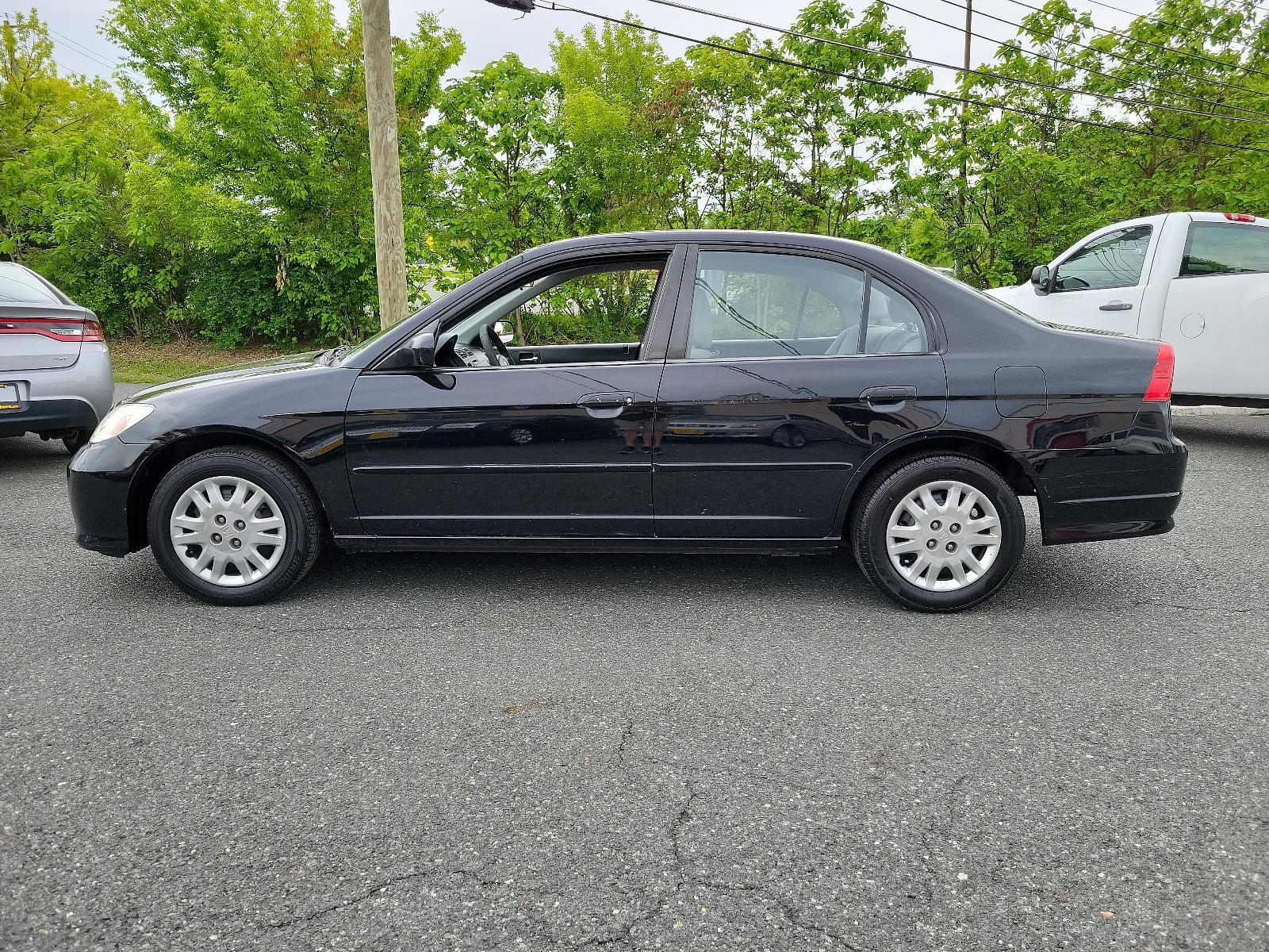 2005 Nighthawk Black Pearl - BK /Gray - GR Honda Civic Sdn LX (JHMES16525S) with an 1.7L SOHC MPFI 16-valve I4 engine engine, located at 50 Eastern Blvd., Essex, MD, 21221, (410) 686-3444, 39.304367, -76.484947 - <p>Practical, efficient, and fun to drive, this 2005 Honda Civic LX Sedan in Nighthawk Black Pearl lives up to its reputation! Powered by a 1.7 Liter 4 Cylinder generating 115hp while connected to the 5 Speed Manual transmission to make the most out of every mile. One trip in our Front Wheel Drive H - Photo #6