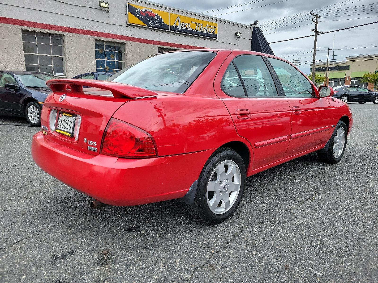 2006 Code Red - A20 /Charcoal - G Nissan Sentra 1.8 S (3N1CB51D06L) with an 1.8L SMPI DOHC 16-valve 4-cyl engine engine, located at 50 Eastern Blvd., Essex, MD, 21221, (410) 686-3444, 39.304367, -76.484947 - <p>Meet our 2006 Nissan Sentra S Sedan that looks sleek in Code Red! Powered by a 1.8 Liter 4 Cylinder generating 126hp connected to the 4 Speed Automatic transmission. This Front Wheel Drive sedan was built to perform while earning up to 34mpg on the highway! The exterior of our Sentra stands out w - Photo #3