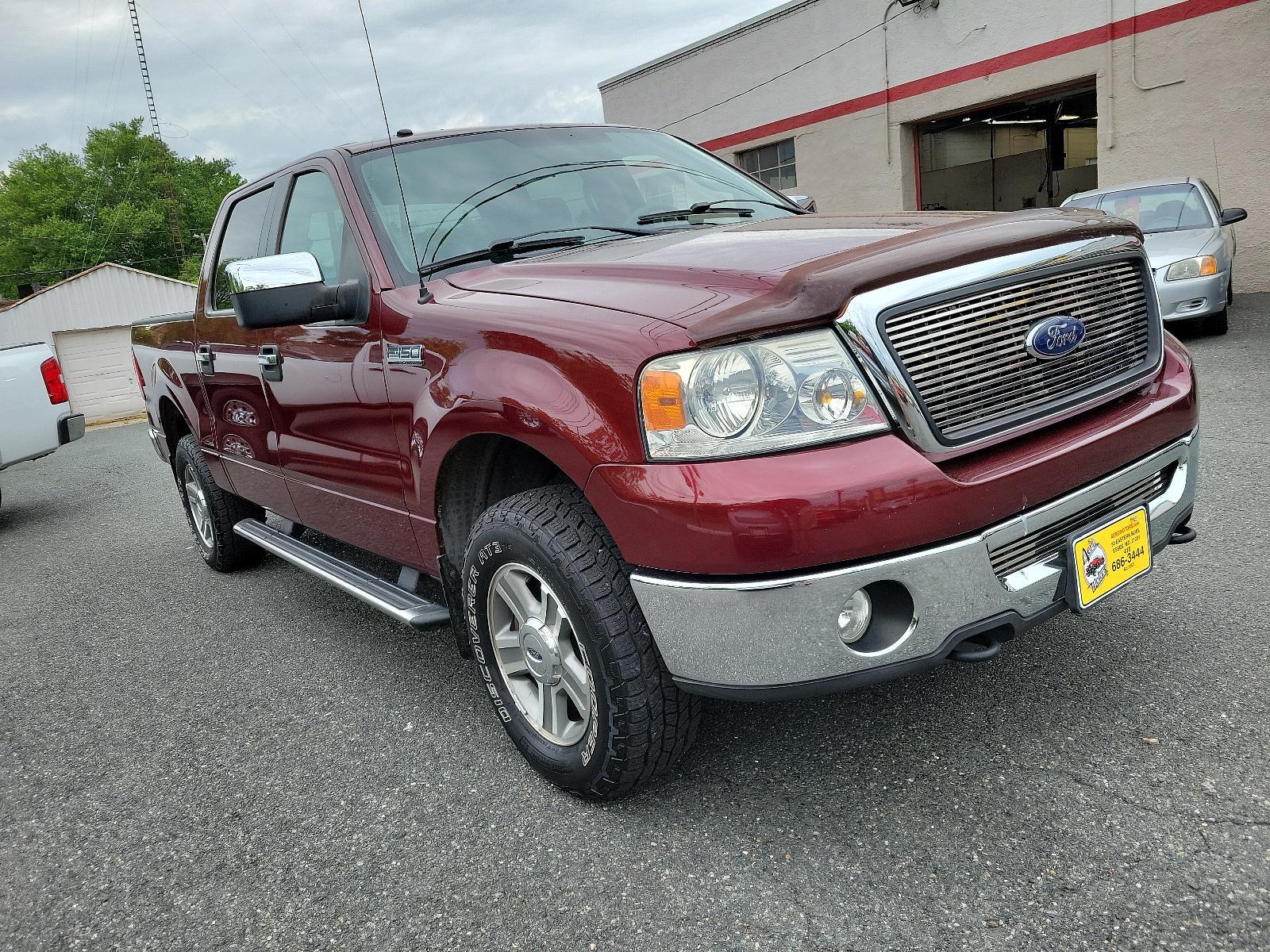 2006 Dark Toreador Red Metallic - JL /Flint - E Ford F-150 XLT (1FTPW14556F) with an 5.4L 3V EFI V8 ENGINE engine, located at 50 Eastern Blvd., Essex, MD, 21221, (410) 686-3444, 39.304367, -76.484947 - <p>This 2006 Ford F-150 XLT 4X4 SuperCrew is a thoroughly modern truck in Dark Toreador Metallic! Powered by a 5.4 Liter V8 generating 300hp while connected to the durable 4 Speed Automatic transmission with Overdrive to make the most of every drive. This Four Wheel Drive F-150 will take on your tou - Photo #2