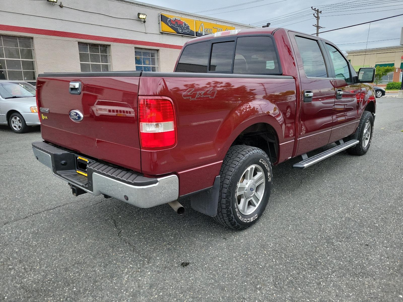 2006 Dark Toreador Red Metallic - JL /Flint - E Ford F-150 XLT (1FTPW14556F) with an 5.4L 3V EFI V8 ENGINE engine, located at 50 Eastern Blvd., Essex, MD, 21221, (410) 686-3444, 39.304367, -76.484947 - <p>This 2006 Ford F-150 XLT 4X4 SuperCrew is a thoroughly modern truck in Dark Toreador Metallic! Powered by a 5.4 Liter V8 generating 300hp while connected to the durable 4 Speed Automatic transmission with Overdrive to make the most of every drive. This Four Wheel Drive F-150 will take on your tou - Photo #3