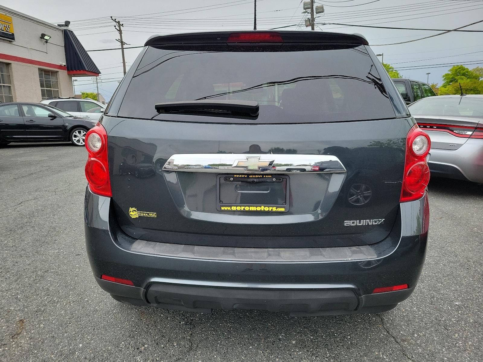 2013 Ashen Gray Metallic - GLJ /Jet Black - AFH Chevrolet Equinox LS (2GNALBEK9D1) with an ENGINE, 2.4L DOHC 4-CYLINDER SIDI (SPARK IGNITION DIRECT INJECTION) engine, located at 50 Eastern Blvd., Essex, MD, 21221, (410) 686-3444, 39.304367, -76.484947 - <p>Our attractive 2013 Chevrolet Equinox LS presented in Ashen Gray Metallic is sure to impress you! Powered by a 2.4 Liter 4 Cylinder that generates 182hp paired to a smooth-shifting 6 Speed Automatic transmission. Our Front Wheel Drive SUV will take you as far down the road as you need to go, scor - Photo #4