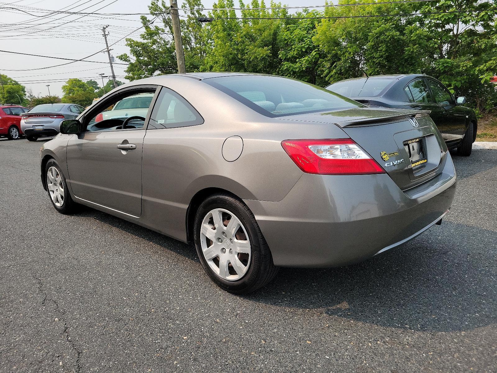2007 Galaxy Gray Metallic - GY /Gray - GR Honda Civic Cpe LX (2HGFG11657H) with an 1.8L SOHC MPFI 16-valve i-VTEC I4 engine engine, located at 50 Eastern Blvd., Essex, MD, 21221, (410) 686-3444, 39.304367, -76.484947 - <p>Our 2007 Honda Civic LX Sedan in Alabaster Silver Metallic retains the efficient, economic design and quality components that have made it one of the world's most popular and successful compact cars! Power comes from a 1.8 Liter 4 Cylinder generating 140hp while paired to a smooth-shifting 5 Spee - Photo #5