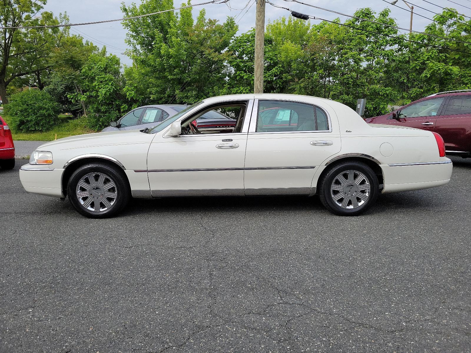 2003 Ceramic White - F6 /Light Parchment - F Lincoln Town Car Cartier Premium (1LNHM83W03Y) with an 4.6L SOHC SMPI V8 ENGINE engine, located at 50 Eastern Blvd., Essex, MD, 21221, (410) 686-3444, 39.304367, -76.484947 - <p>Full-size luxury at its finest, introducing our 2003 Lincoln Town Car Cartier Premium Sedan showcased in Ceramic White. Powered by a 4.6 Liter V8 generating 239hp paired with a 4 Speed Automatic transmission. This Rear Wheel Drive sedan's smooth lines and chrome wheels help it earn up to 25mpg on - Photo #6