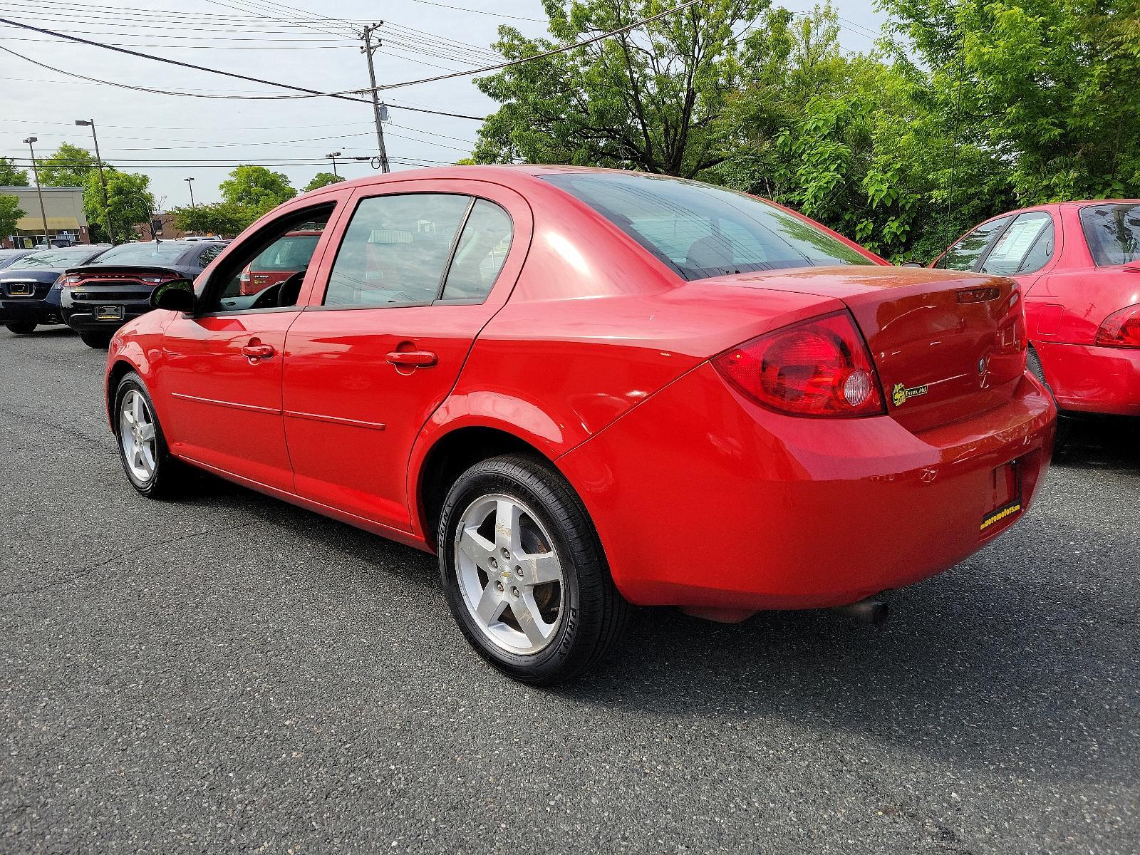 2010 Victory Red - 74U /Ebony - 192 Chevrolet Cobalt LT w/2LT (1G1AF5F54A7) with an ENGINE, ECOTEC 2.2L CONTINUOUS VARIABLE VALVE TIMING DOHC 4-CYLINDER MFI engine, located at 50 Eastern Blvd., Essex, MD, 21221, (410) 686-3444, 39.304367, -76.484947 - <p>Meet our 2010 Chevrolet Cobalt LT Sedan presented in Victory Red and offers a solid performance. Powered by a 2.2 Liter 4 Cylinder that generates 155hp while paired with a 4 Speed Automatic transmission. This efficient Front Wheel Drive scores near 33mpg on the highway. The outside of our Sedan i - Photo #5