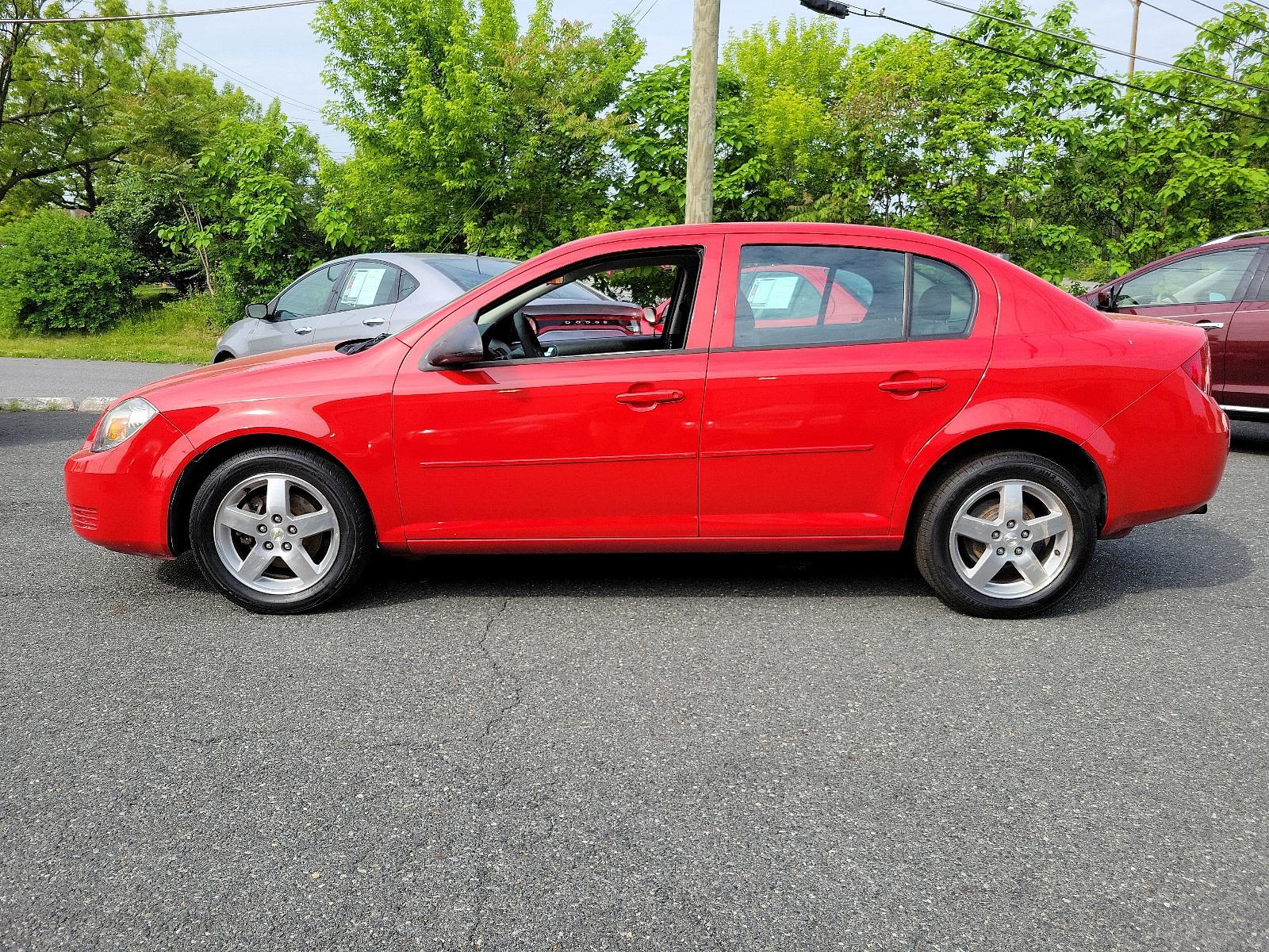 2010 Victory Red - 74U /Ebony - 192 Chevrolet Cobalt LT w/2LT (1G1AF5F54A7) with an ENGINE, ECOTEC 2.2L CONTINUOUS VARIABLE VALVE TIMING DOHC 4-CYLINDER MFI engine, located at 50 Eastern Blvd., Essex, MD, 21221, (410) 686-3444, 39.304367, -76.484947 - <p>Meet our 2010 Chevrolet Cobalt LT Sedan presented in Victory Red and offers a solid performance. Powered by a 2.2 Liter 4 Cylinder that generates 155hp while paired with a 4 Speed Automatic transmission. This efficient Front Wheel Drive scores near 33mpg on the highway. The outside of our Sedan i - Photo #6