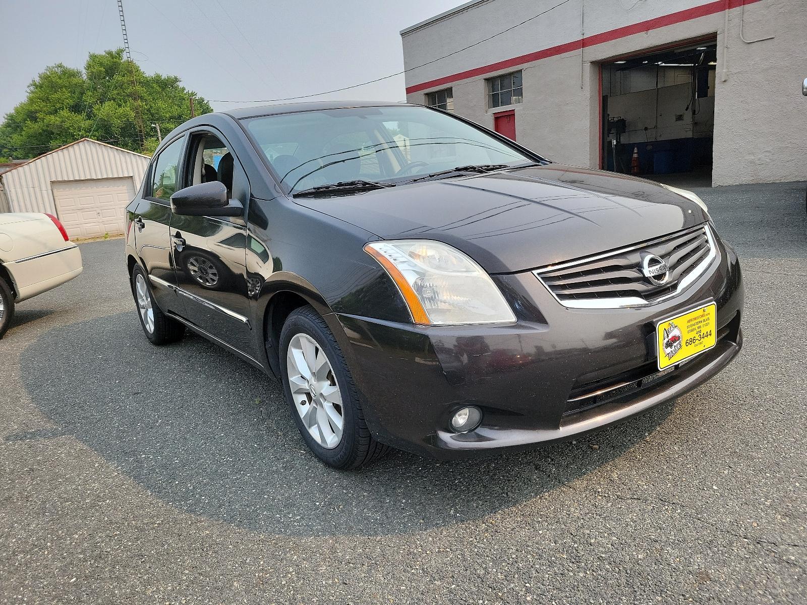 2011 Espresso Black - CAE /Charcoal - X Nissan Sentra 2.0 SL (3N1AB6AP2BL) with an 2.0L DOHC 16-valve SMPI I4 engine engine, located at 50 Eastern Blvd., Essex, MD, 21221, (410) 686-3444, 39.304367, -76.484947 - <p>Meet our 2011 Nissan Sentra 2.0 SL Sedan in Super Black, and you will know you have made the right choice! Powered by a 2.0 Liter 4 Cylinder generating 140hp connected to an innovative CVT. Our Front Wheel Drive sedan offers nearly 34mpg on the highway and boasts a driving experience you will lov - Photo #2