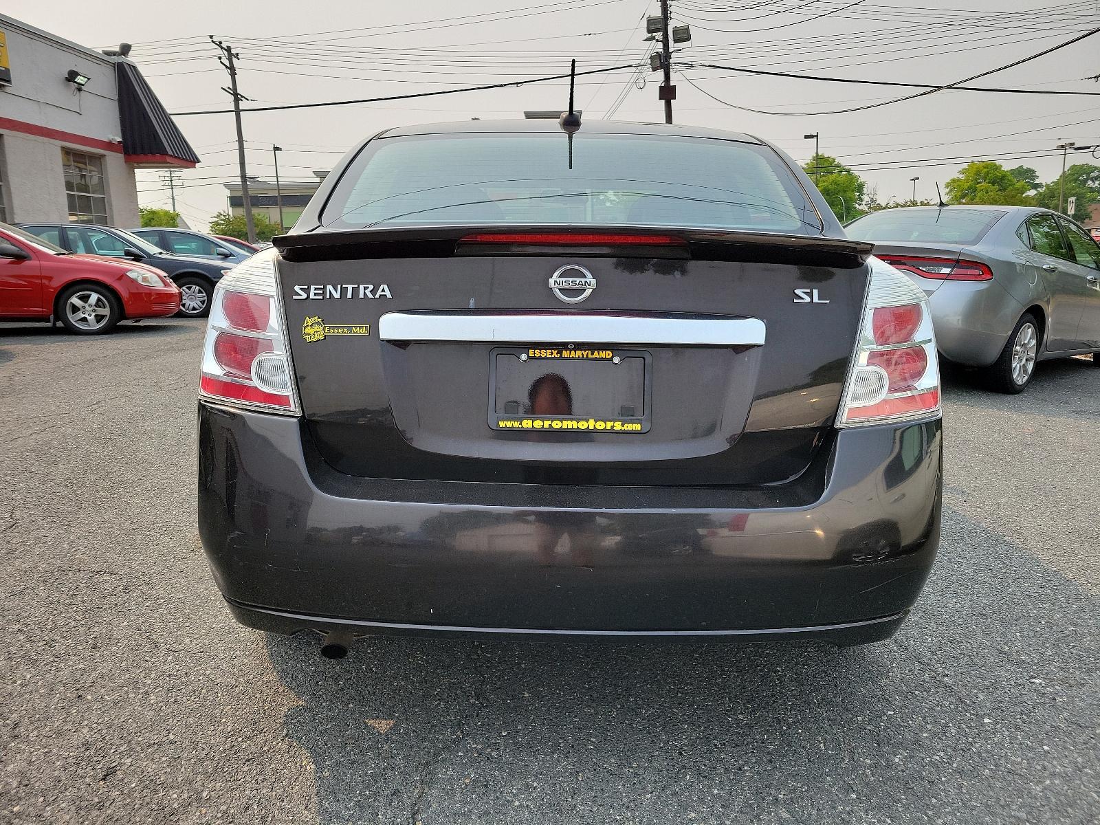 2011 Espresso Black - CAE /Charcoal - X Nissan Sentra 2.0 SL (3N1AB6AP2BL) with an 2.0L DOHC 16-valve SMPI I4 engine engine, located at 50 Eastern Blvd., Essex, MD, 21221, (410) 686-3444, 39.304367, -76.484947 - <p>Meet our 2011 Nissan Sentra 2.0 SL Sedan in Super Black, and you will know you have made the right choice! Powered by a 2.0 Liter 4 Cylinder generating 140hp connected to an innovative CVT. Our Front Wheel Drive sedan offers nearly 34mpg on the highway and boasts a driving experience you will lov - Photo #4