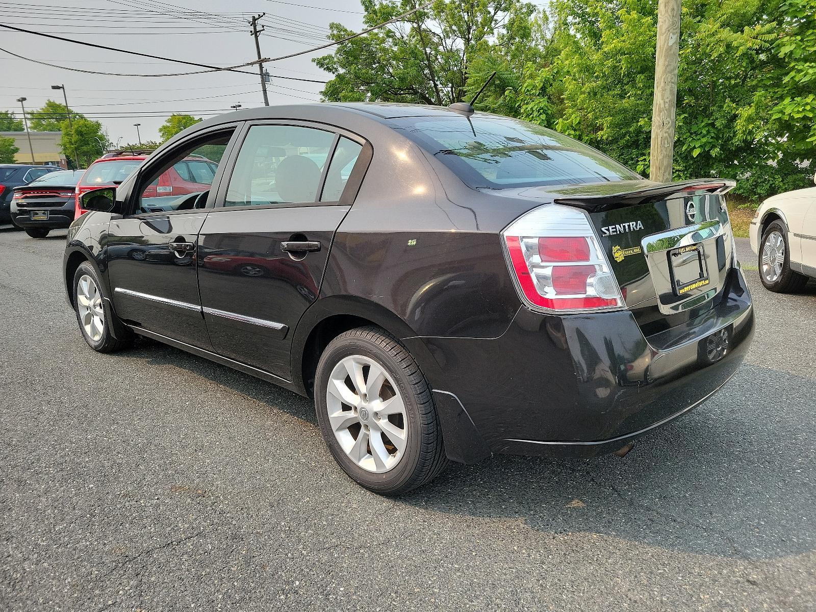 2011 Espresso Black - CAE /Charcoal - X Nissan Sentra 2.0 SL (3N1AB6AP2BL) with an 2.0L DOHC 16-valve SMPI I4 engine engine, located at 50 Eastern Blvd., Essex, MD, 21221, (410) 686-3444, 39.304367, -76.484947 - <p>Meet our 2011 Nissan Sentra 2.0 SL Sedan in Super Black, and you will know you have made the right choice! Powered by a 2.0 Liter 4 Cylinder generating 140hp connected to an innovative CVT. Our Front Wheel Drive sedan offers nearly 34mpg on the highway and boasts a driving experience you will lov - Photo #5