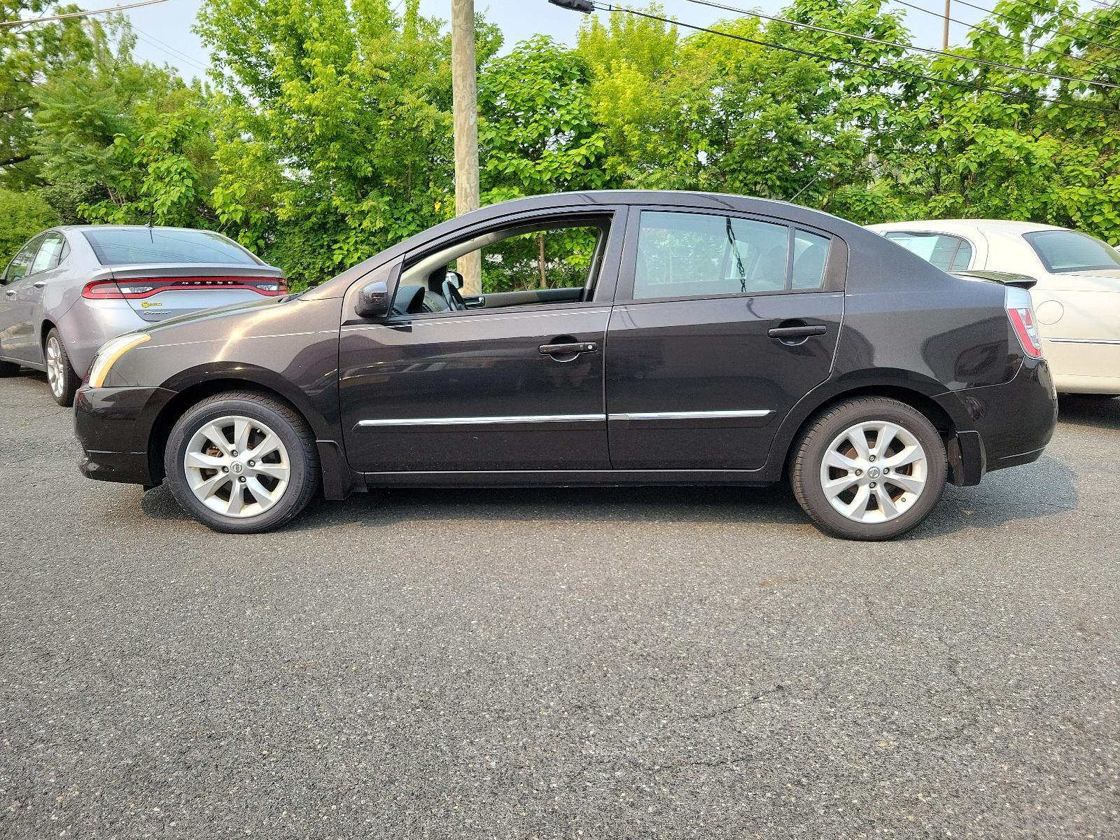 2011 Espresso Black - CAE /Charcoal - X Nissan Sentra 2.0 SL (3N1AB6AP2BL) with an 2.0L DOHC 16-valve SMPI I4 engine engine, located at 50 Eastern Blvd., Essex, MD, 21221, (410) 686-3444, 39.304367, -76.484947 - <p>Meet our 2011 Nissan Sentra 2.0 SL Sedan in Super Black, and you will know you have made the right choice! Powered by a 2.0 Liter 4 Cylinder generating 140hp connected to an innovative CVT. Our Front Wheel Drive sedan offers nearly 34mpg on the highway and boasts a driving experience you will lov - Photo #6