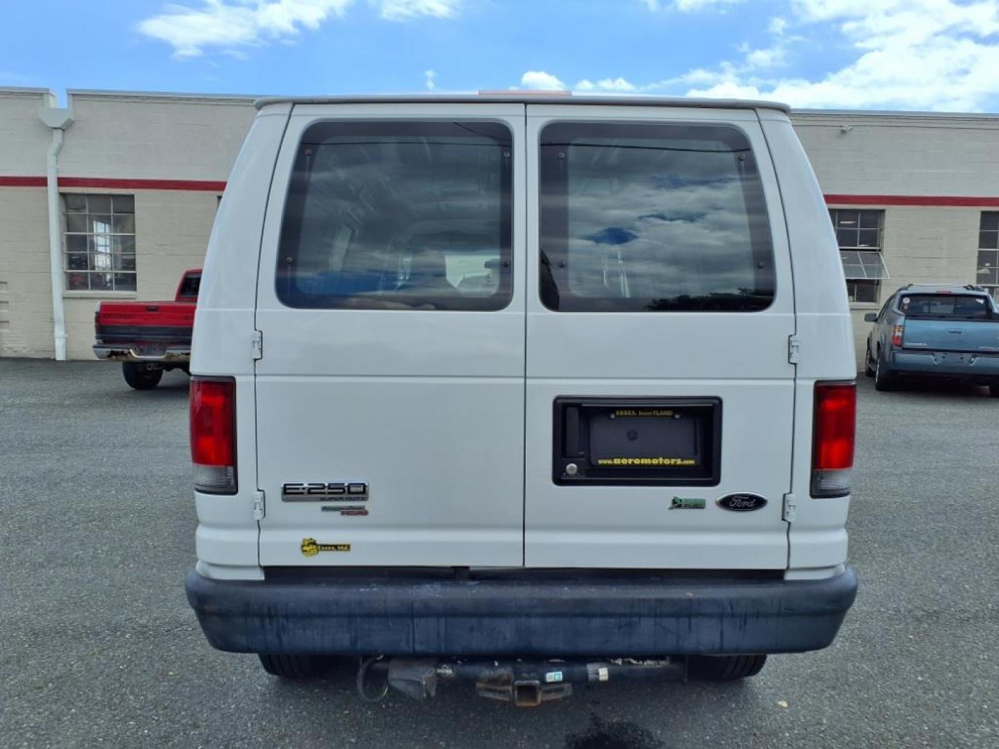 2014 White Ford E-Series E-250 (1FTNE2EW2ED) with an 4.6L 8 Cylinder Sequential-Port F.I. engine, Automatic transmission, located at 50 Eastern Blvd., Essex, MD, 21221, (410) 686-3444, 39.304367, -76.484947 - Photo#3