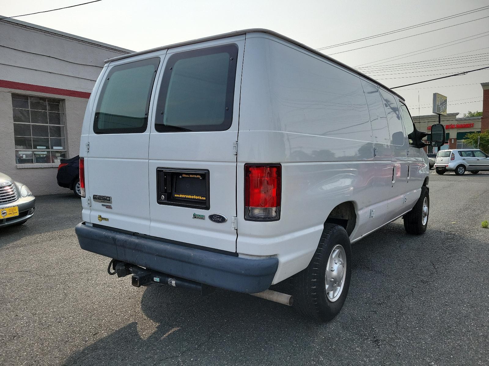 2014 Oxford White - YZ /Medium Flint - AE Ford Econoline Cargo Van Commercial (1FTNE2EW2ED) with an ENGINE: 4.6L EFI V8 FFV CAPABLE engine, located at 50 Eastern Blvd., Essex, MD, 21221, (410) 686-3444, 39.304367, -76.484947 - <p>Our durable 2014 Ford E-250 Econoline Commercial C<span style="color: var(--bs-card-color); font-weight: var(--bs-body-font-weight);">argo Van is shown in Oxford White. This time-tested workhorse is built on a rugged platform and is powered by a dependable 4.6 Liter V8 that offers 225hp and is co - Photo #3