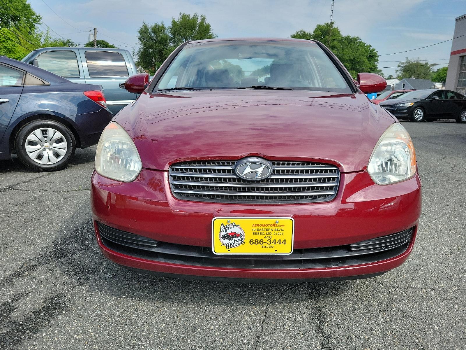 2006 Wine Red Pearl - 5R /Gray - FZ Hyundai Accent GLS (KMHCN46C26U) with an 1.6L DOHC MPI 16-valve I4 engine w/continuously variable valve timing (CVVT) engine, located at 50 Eastern Blvd., Essex, MD, 21221, (410) 686-3444, 39.304367, -76.484947 - <p>Our 2006 Hyundai Elantra GLS Sedan presented in Wine Red Pearl boasts comfort and style. Powered by an efficient 1.6 Liter 4 Cylinder connected to a 5 Speed Automatic transmission. Our Front Wheel Drive Sedan boasts nearly 36mpg on the open road and turns heads with its timeless styling. </p><p>< - Photo #1