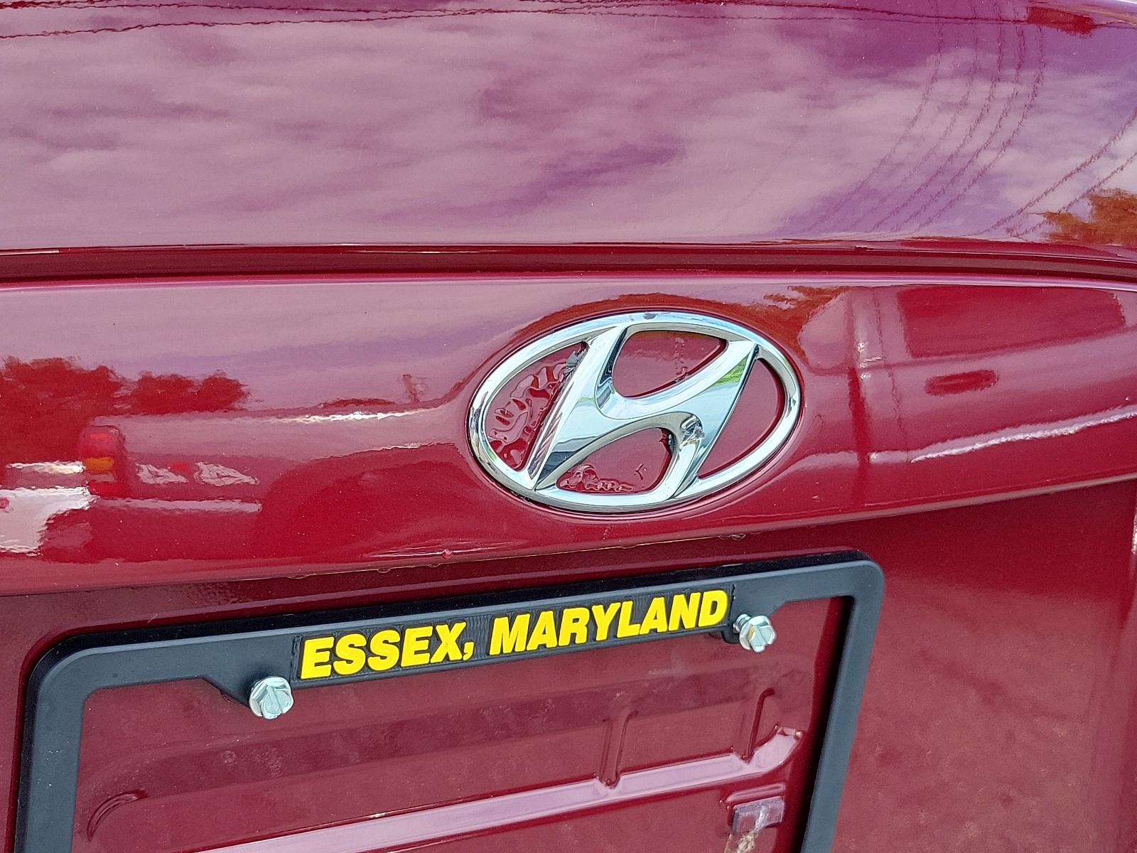 2006 Wine Red Pearl - 5R /Gray - FZ Hyundai Accent GLS (KMHCN46C26U) with an 1.6L DOHC MPI 16-valve I4 engine w/continuously variable valve timing (CVVT) engine, located at 50 Eastern Blvd., Essex, MD, 21221, (410) 686-3444, 39.304367, -76.484947 - <p>Our 2006 Hyundai Elantra GLS Sedan presented in Wine Red Pearl boasts comfort and style. Powered by an efficient 1.6 Liter 4 Cylinder connected to a 5 Speed Automatic transmission. Our Front Wheel Drive Sedan boasts nearly 36mpg on the open road and turns heads with its timeless styling. </p><p>< - Photo #23